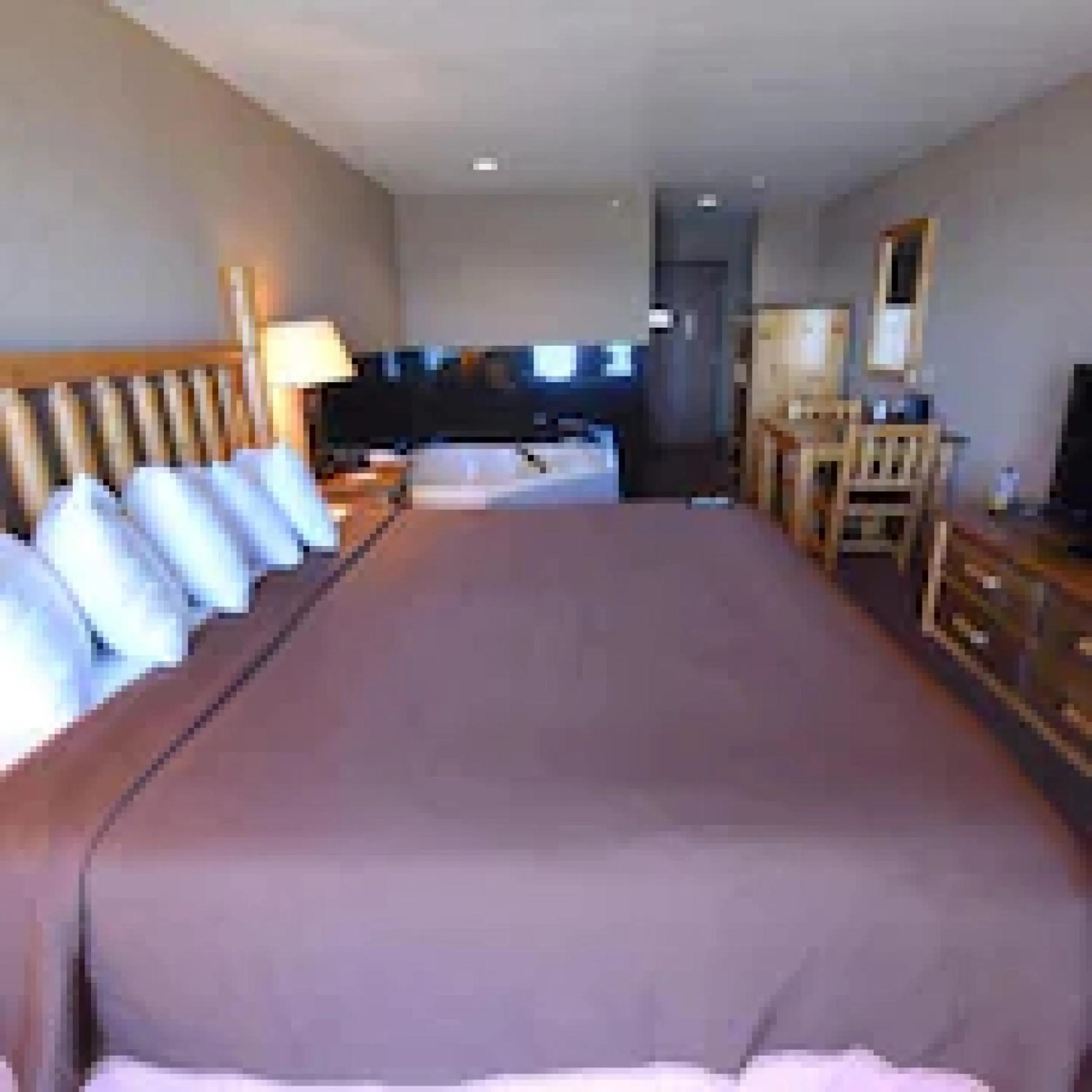 Bed in Bridge Vista Beach Hotel and Convention Center