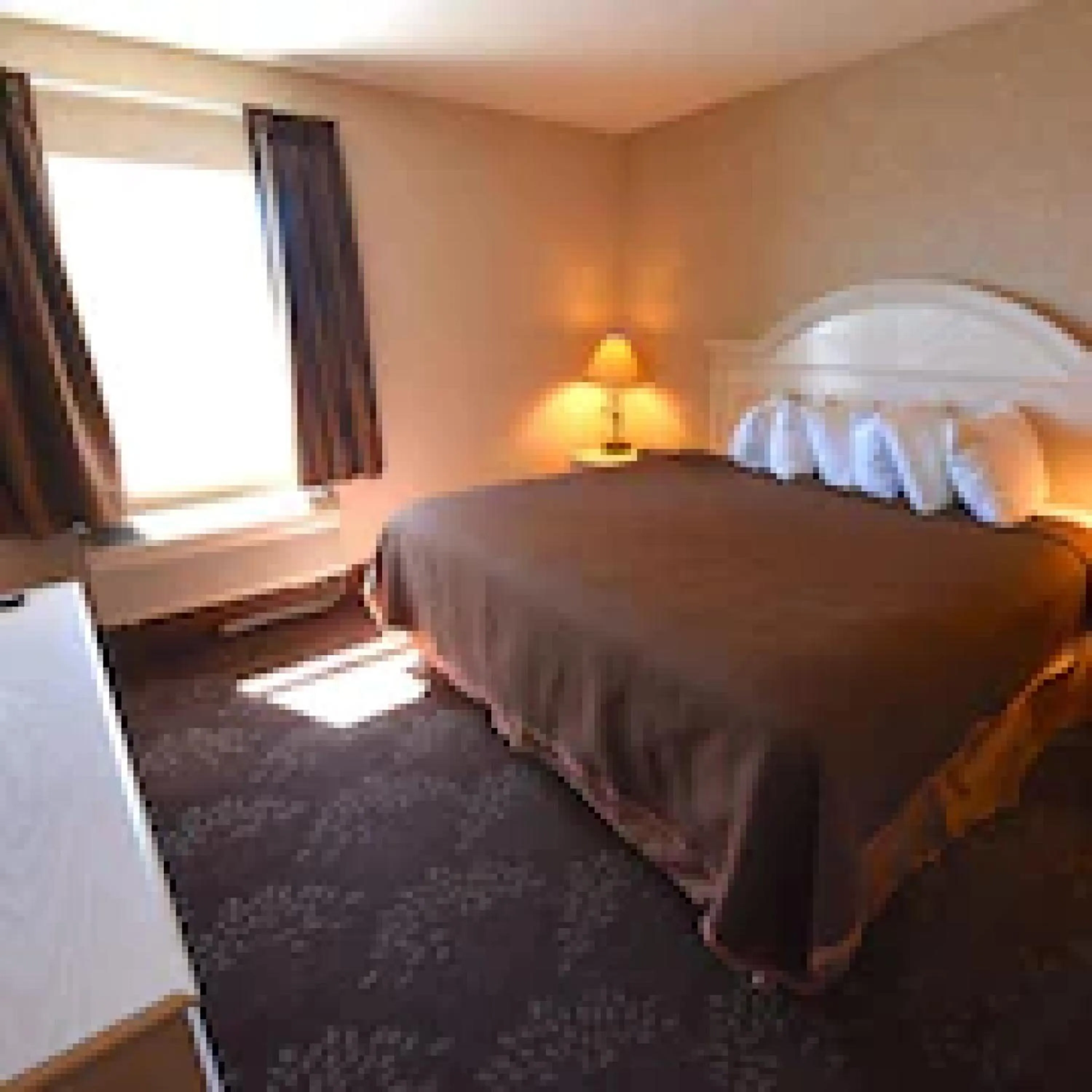 Bed in Bridge Vista Beach Hotel and Convention Center