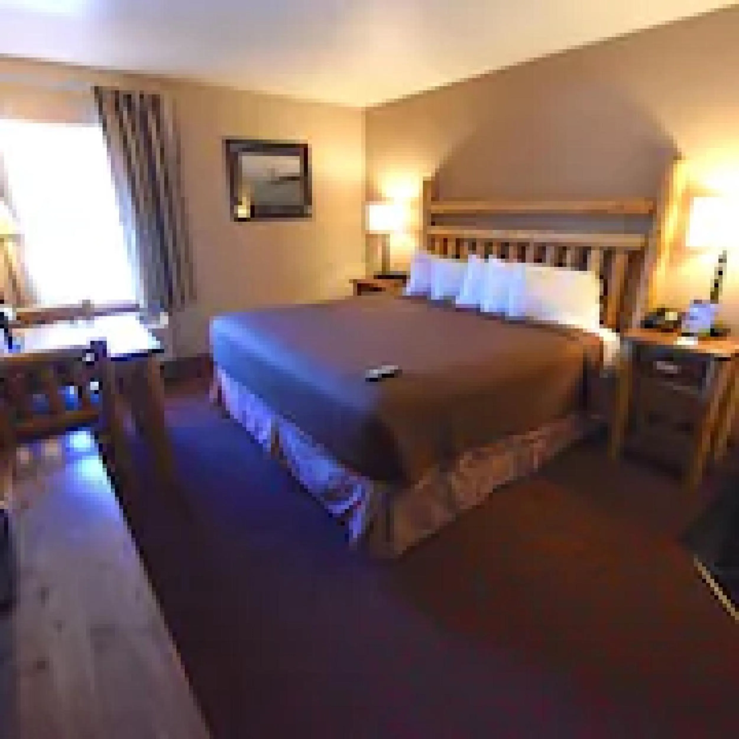 Bed in Bridge Vista Beach Hotel and Convention Center