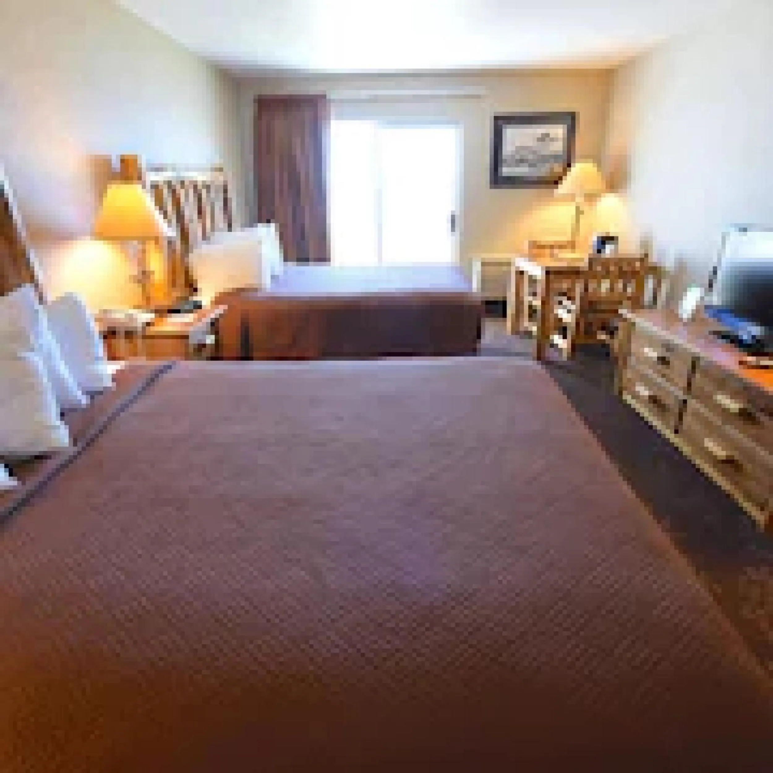 Bed in Bridge Vista Beach Hotel and Convention Center