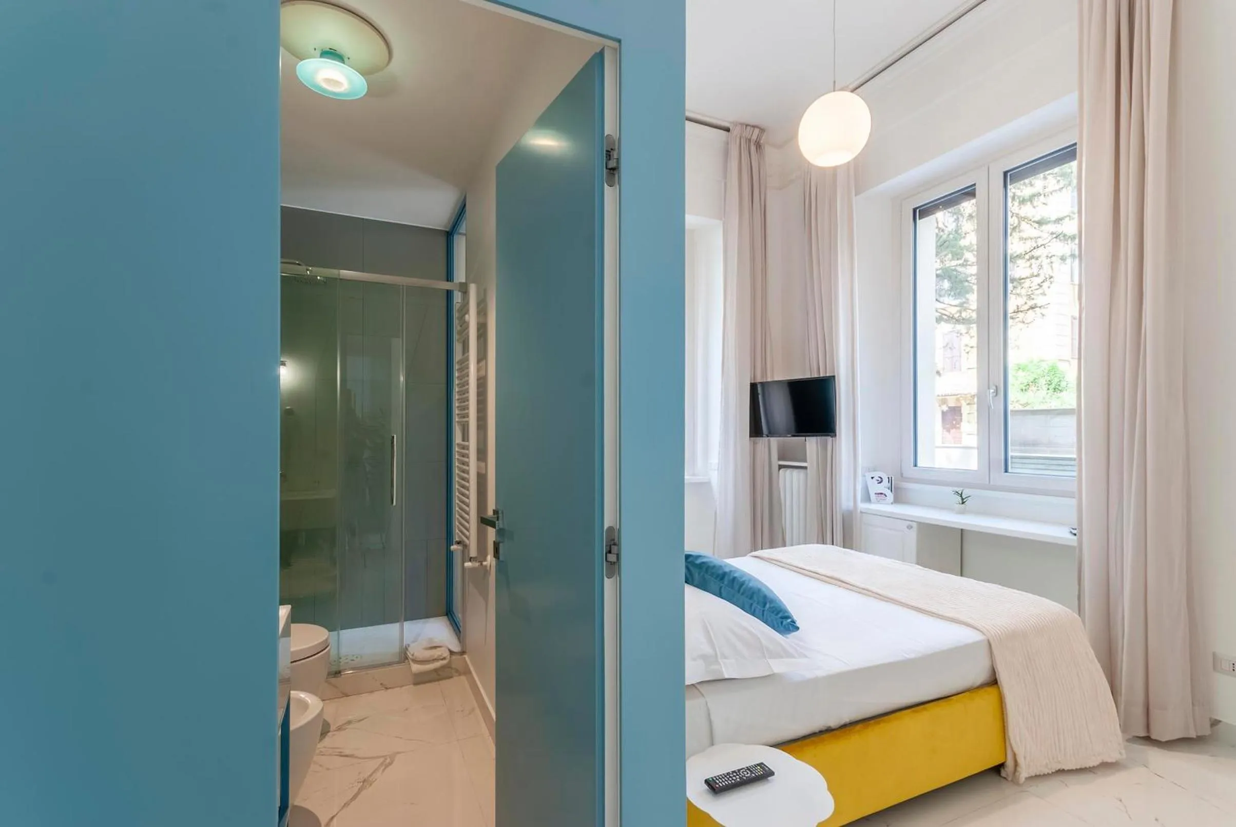 Bed in Bea Suites Luxury Rooms