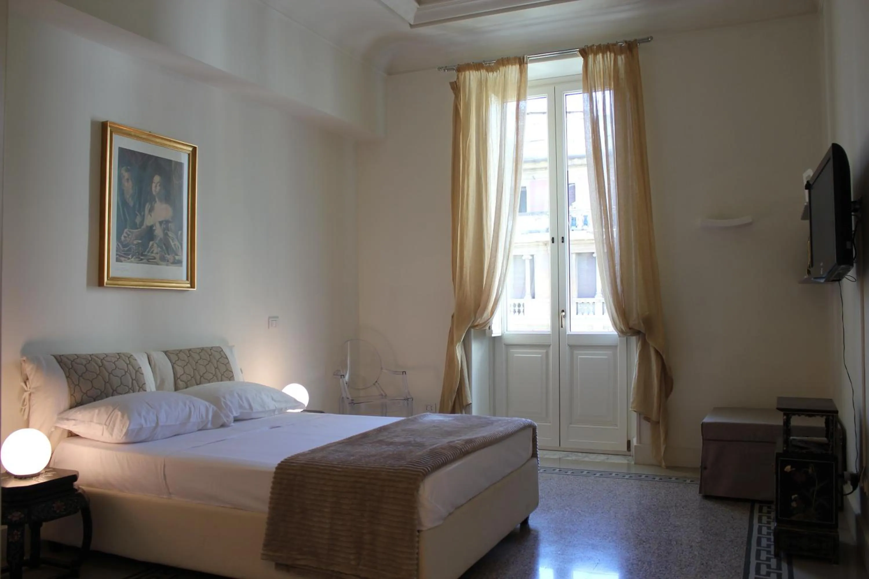 Bed in Bea Suites Luxury Rooms