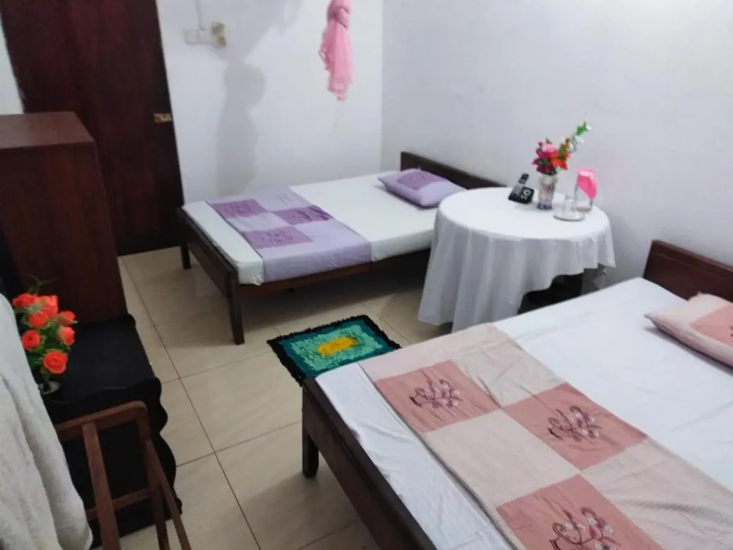 Bed in Jayanthi Surf Dreams