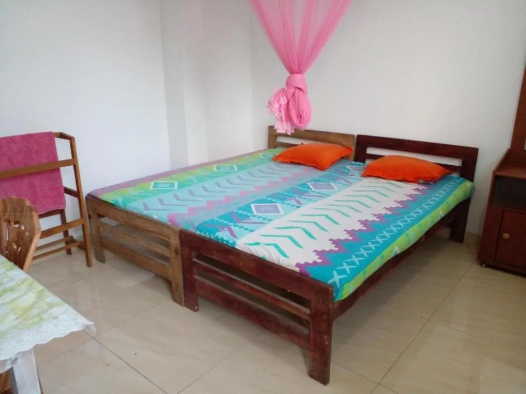 Bed in Jayanthi Surf Dreams