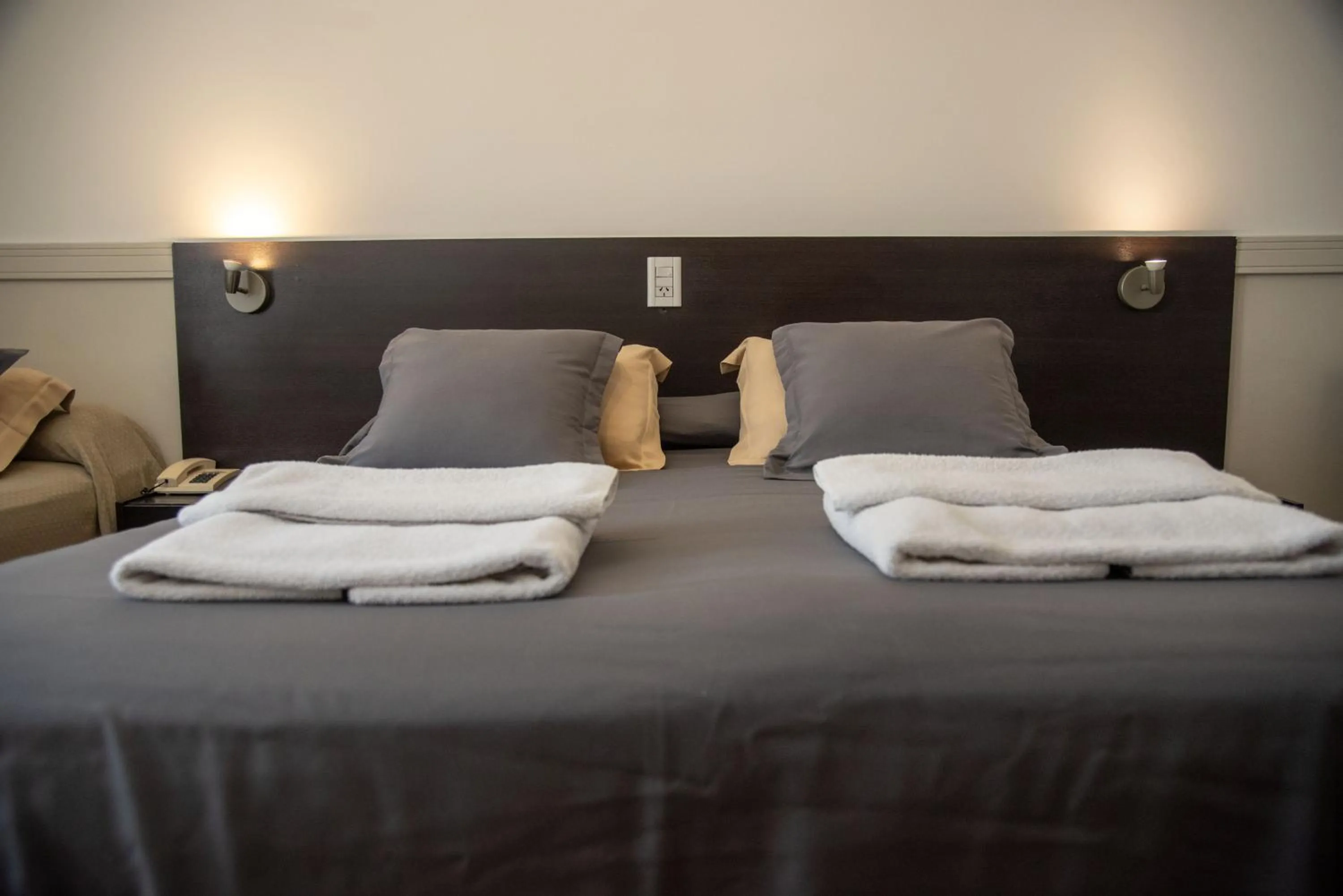 Bed in Abril Hotel Boutique