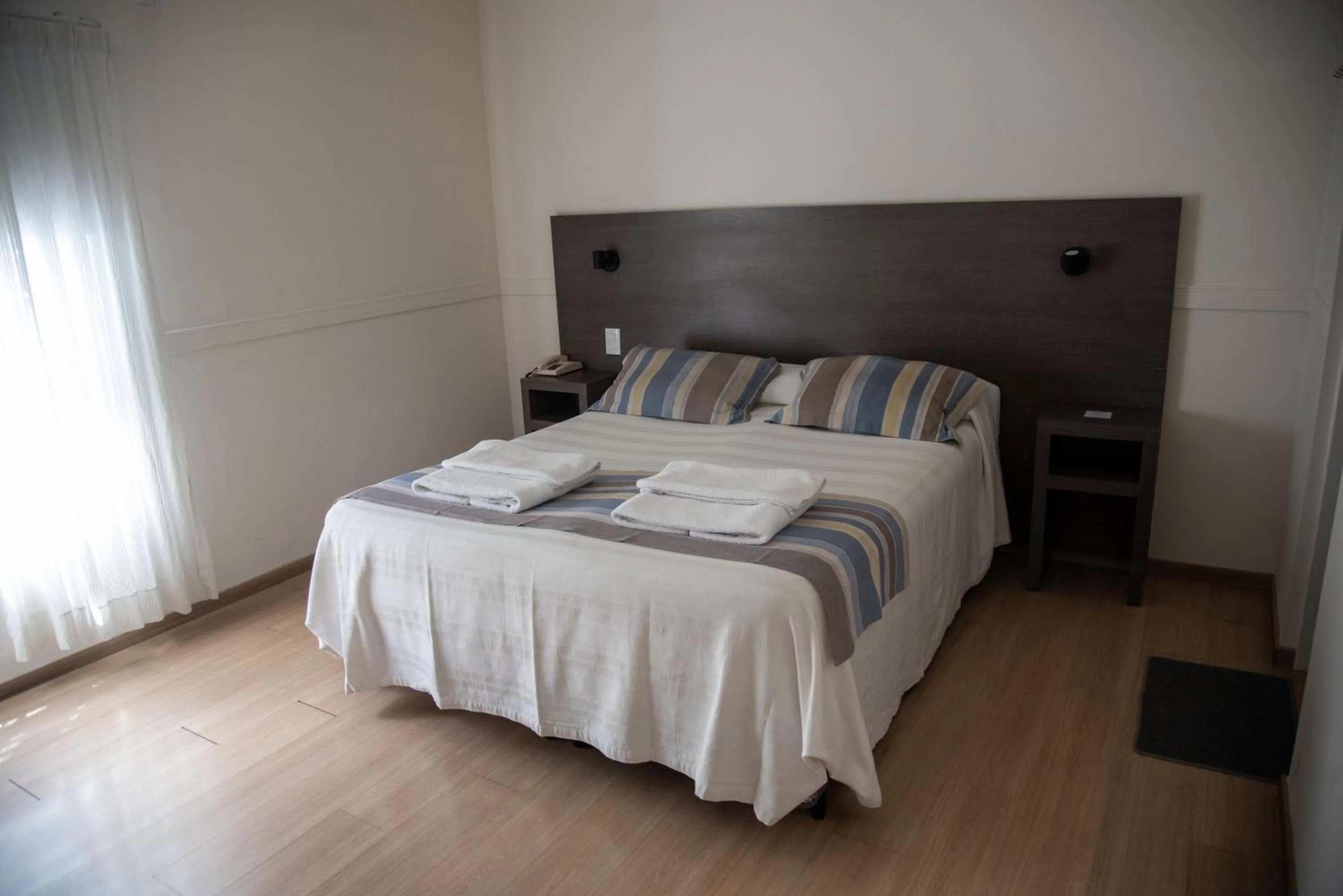 Bed in Abril Hotel Boutique