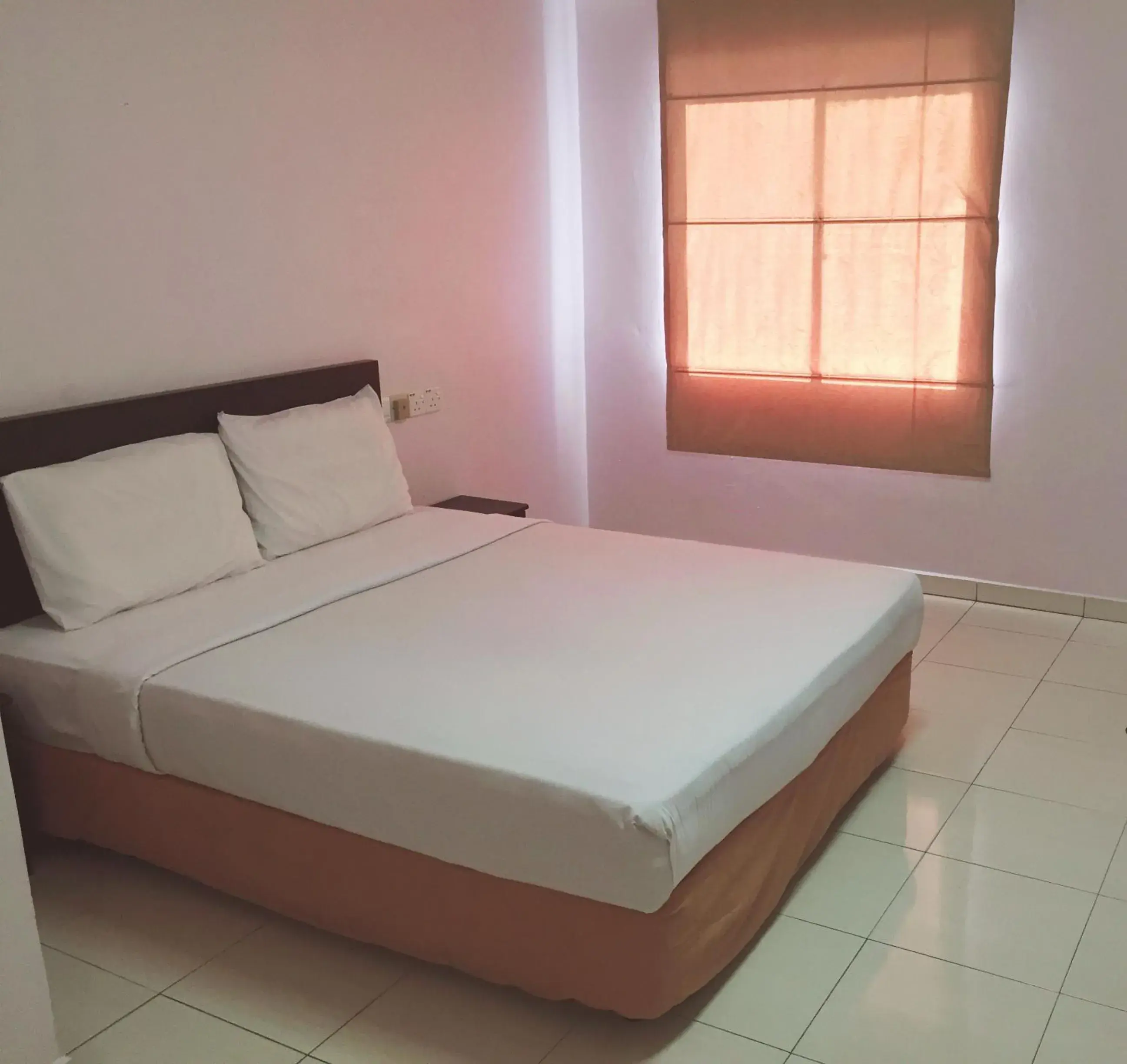 Bed in Raja Inn Bed in Raja Inn