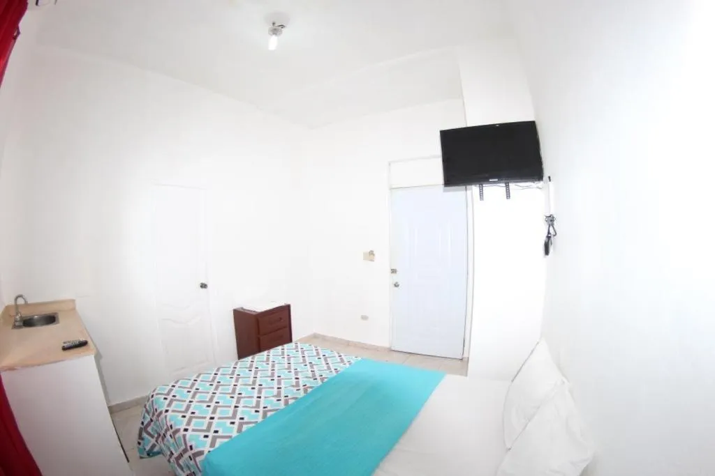 Bed in Caribbean Hotel Santo Domingo