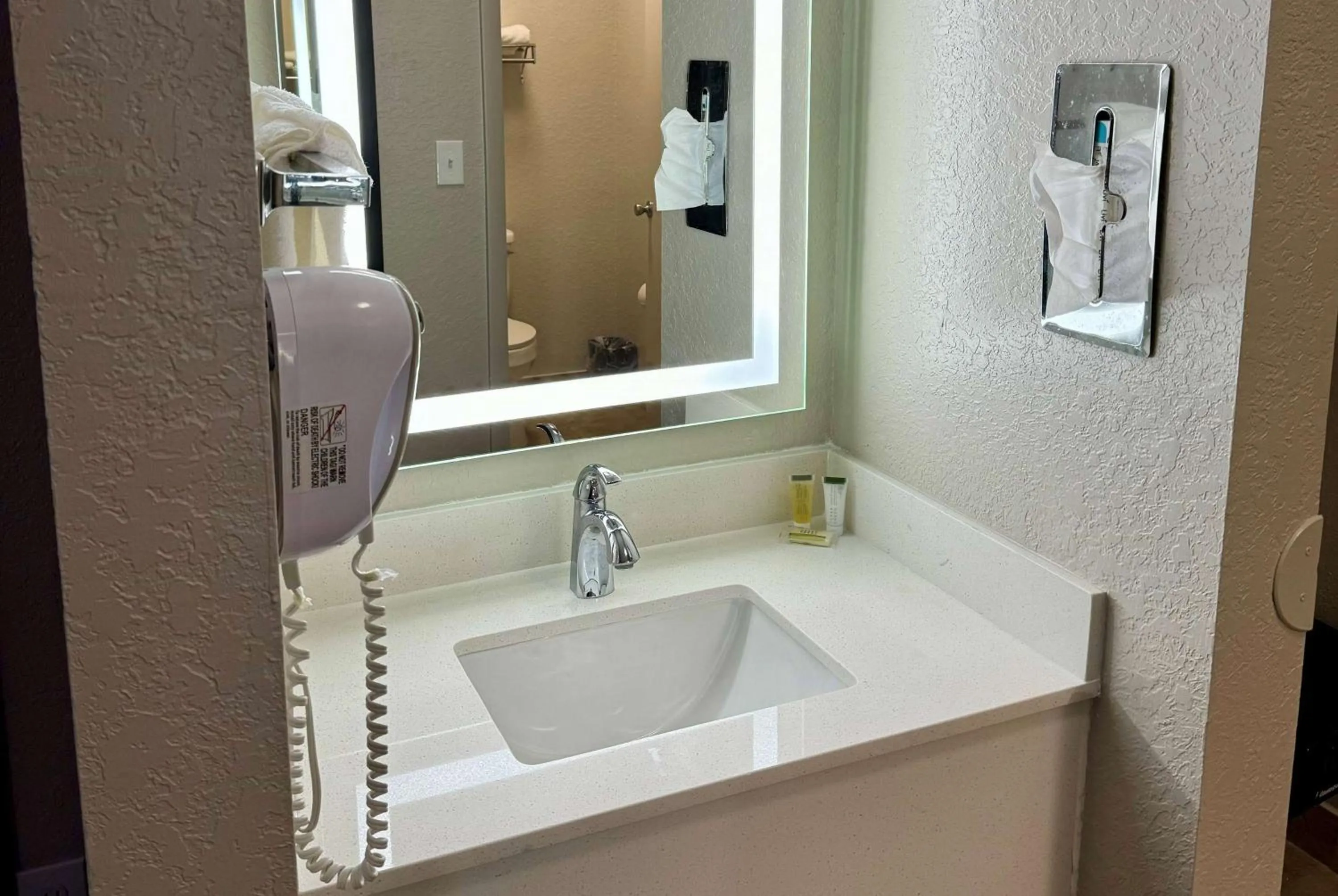 TV and multimedia in Days Inn by Wyndham Sarasota I-75