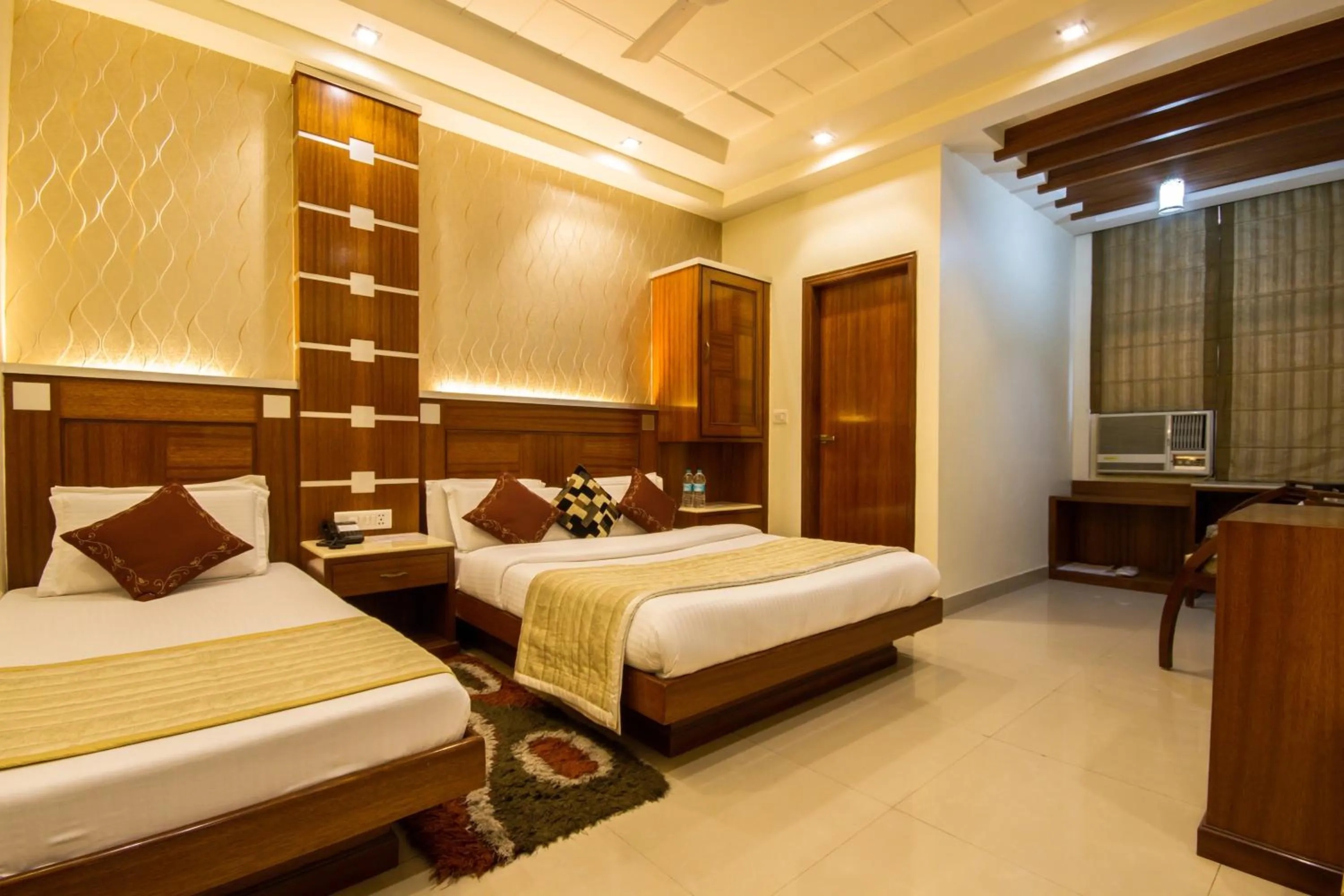 Photo of the whole room, Bed in Hotel Aster Inn New Delhi