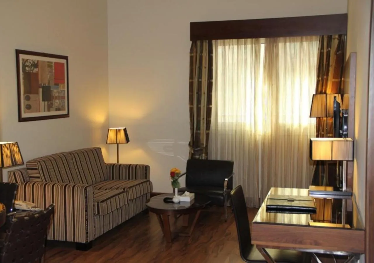 Living room in Downtown Plaza Hotel Apartment Pet Friendly