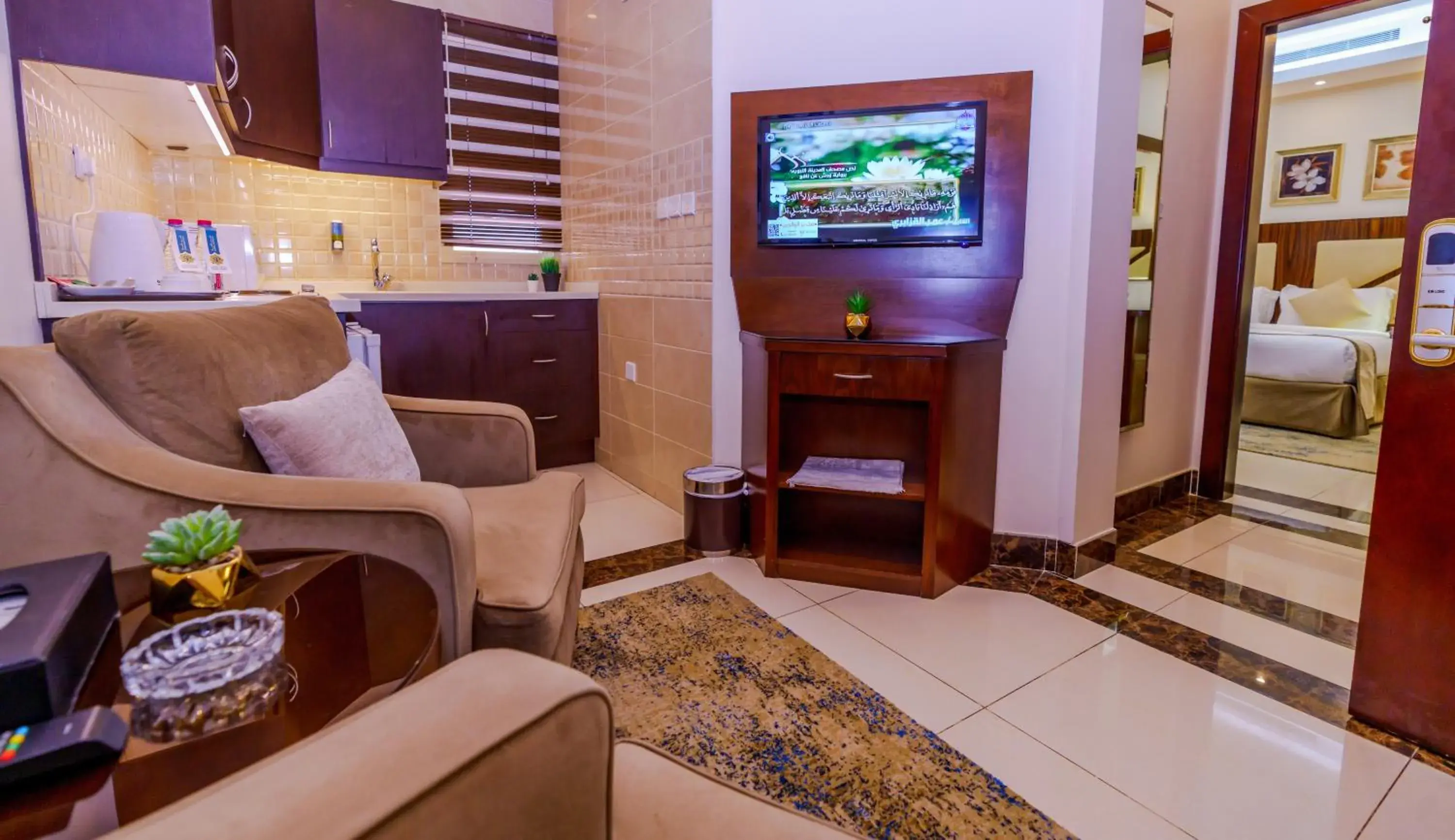 Seating area, Bed in Sun Park Hotel Suites Seating area, Bed in Sun Park Hotel Suites