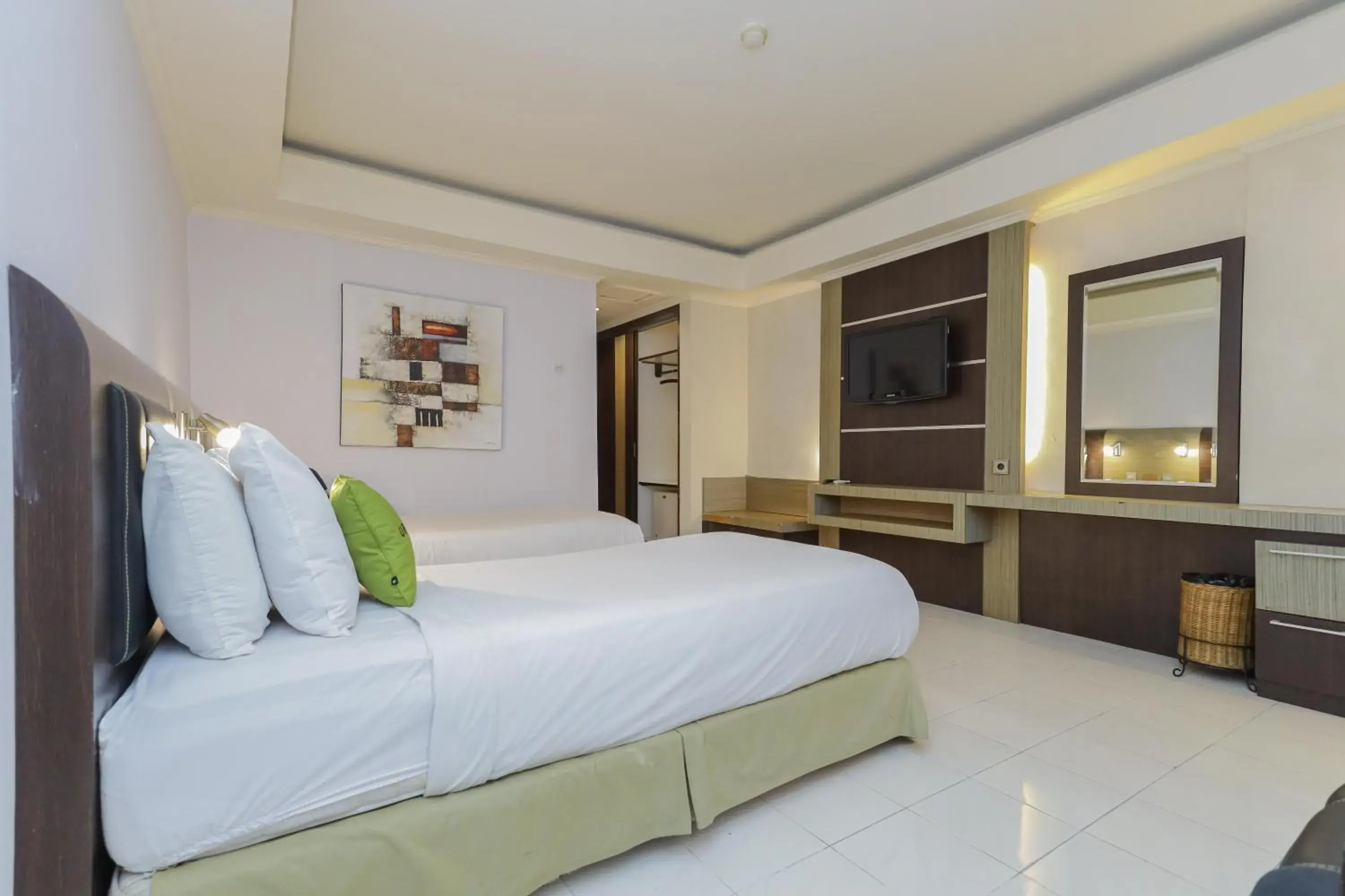 Bedroom, Bed in Urbanview Hotel Taman Suci Denpasar Bali Bedroom, Bed in Urbanview Hotel Taman Suci Denpasar Bali