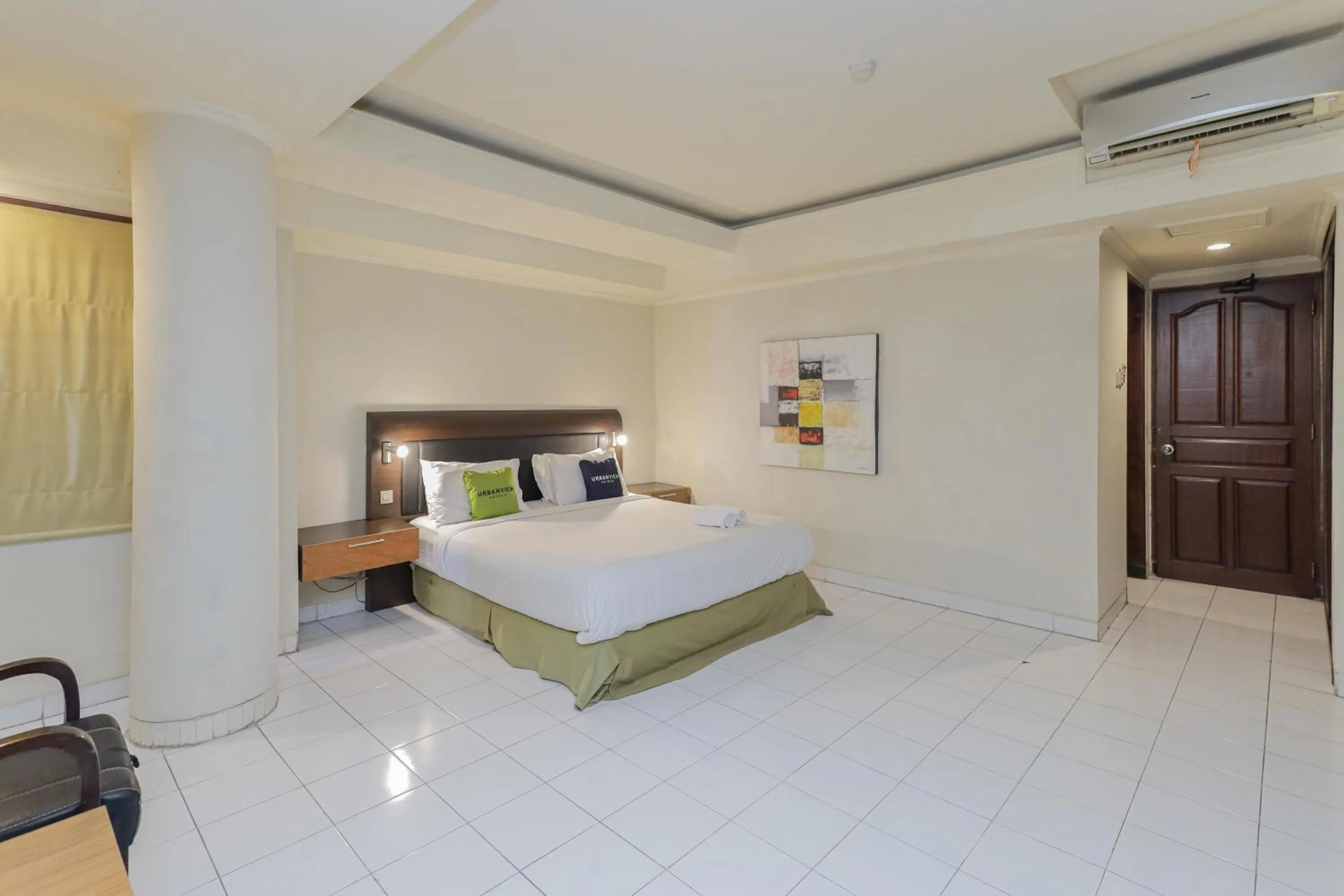 Bedroom, Bed in Urbanview Hotel Taman Suci Denpasar Bali