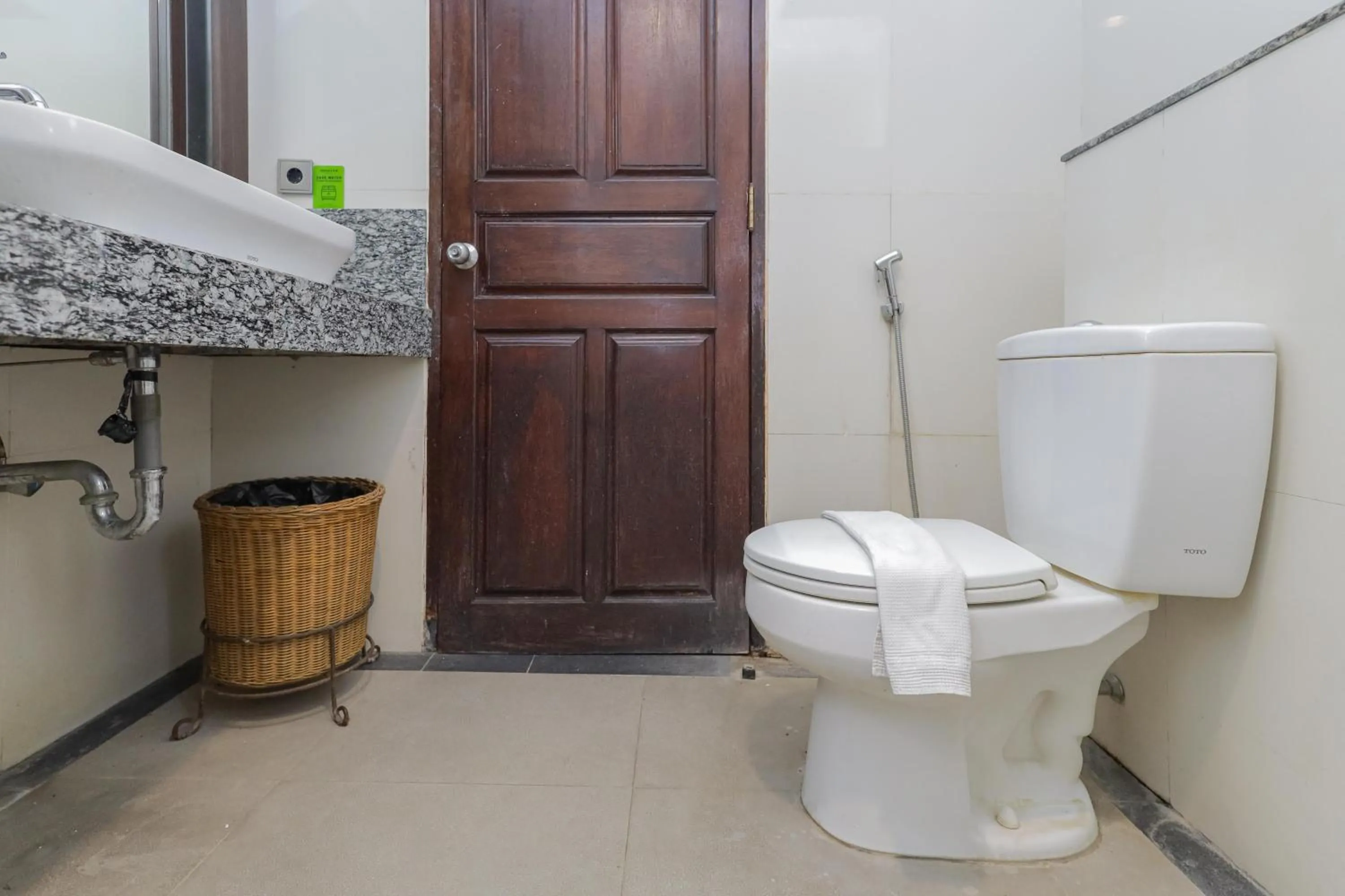 Bathroom in Urbanview Hotel Taman Suci Denpasar Bali