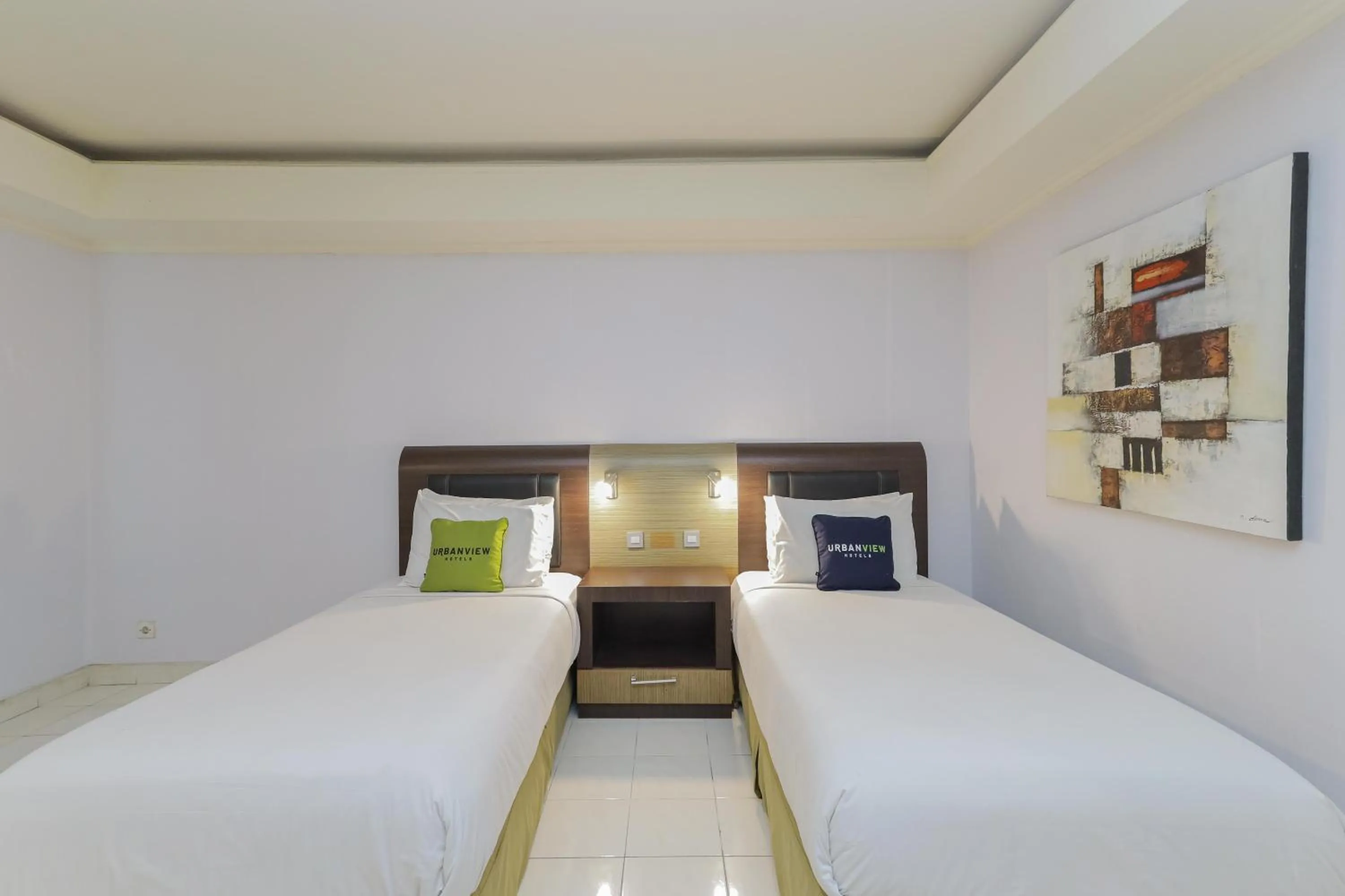 Bedroom, Bed in Urbanview Hotel Taman Suci Denpasar Bali