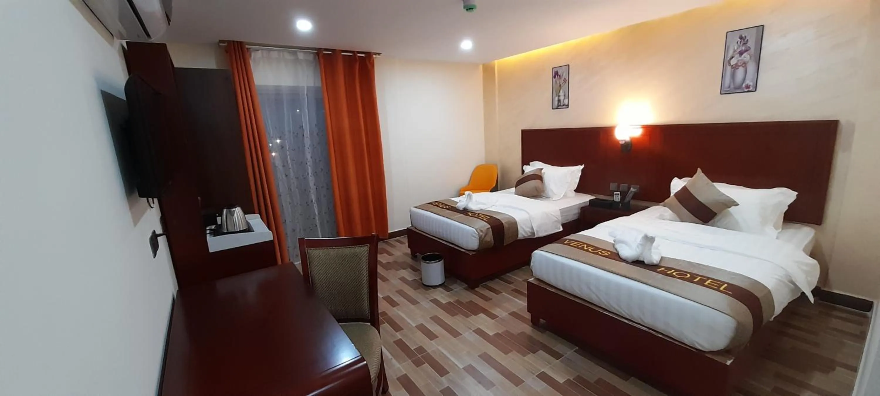 Landmark view, Bed in Venus Hotel