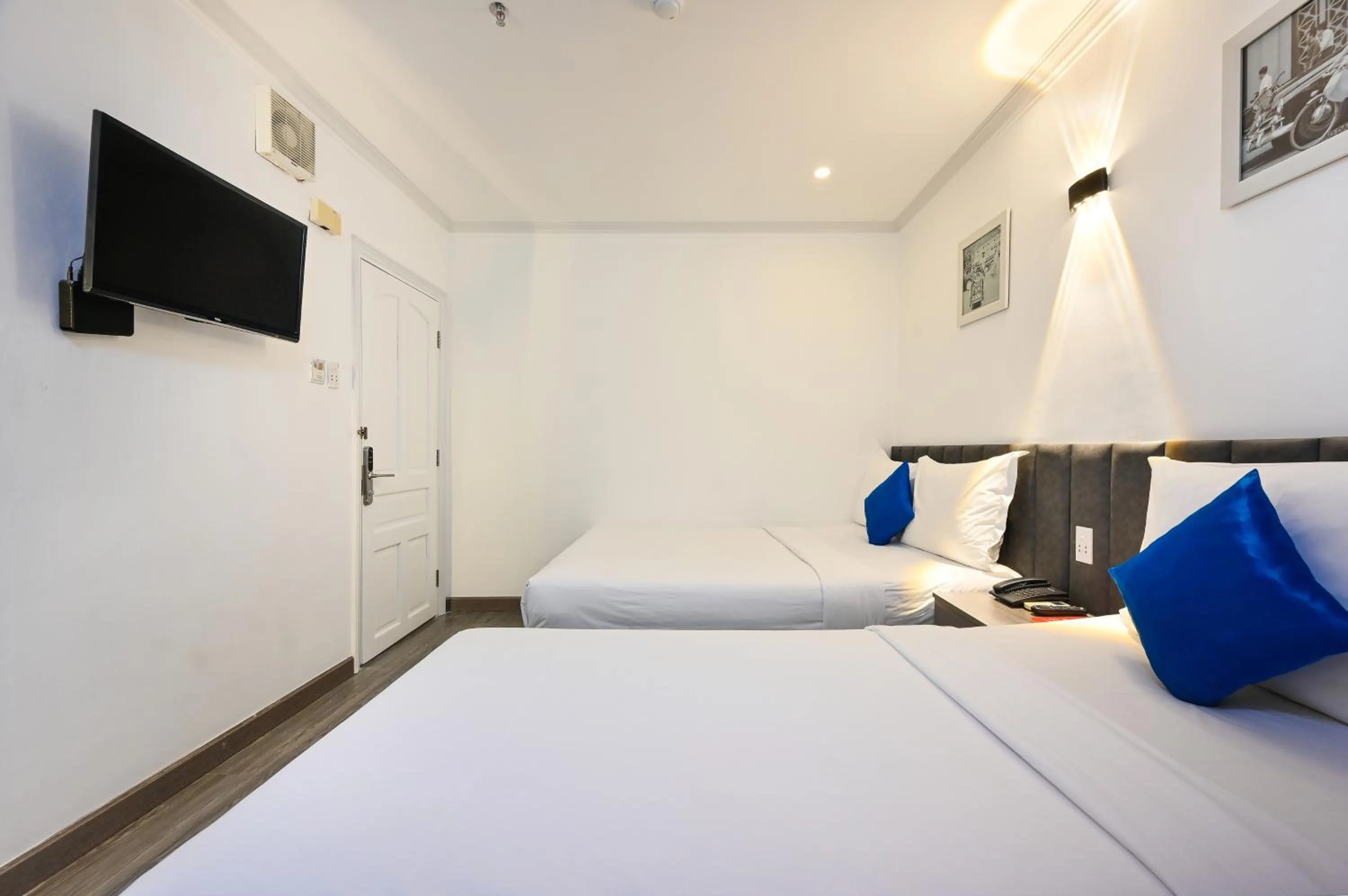 Photo of the whole room, Bed in Ruby Saigon Hotel - Ben Thanh