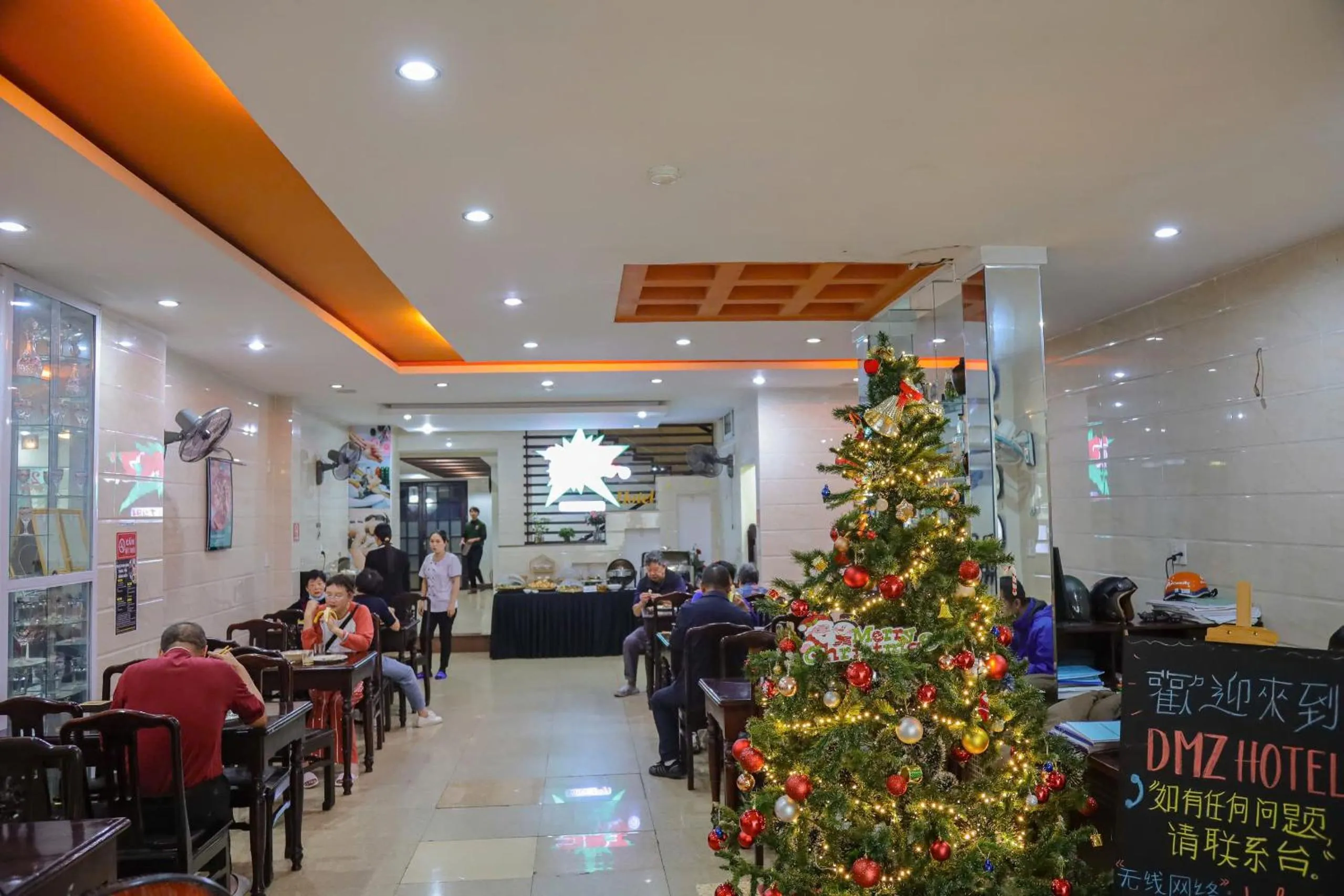 Communal lounge/ TV room in DMZ Hotel