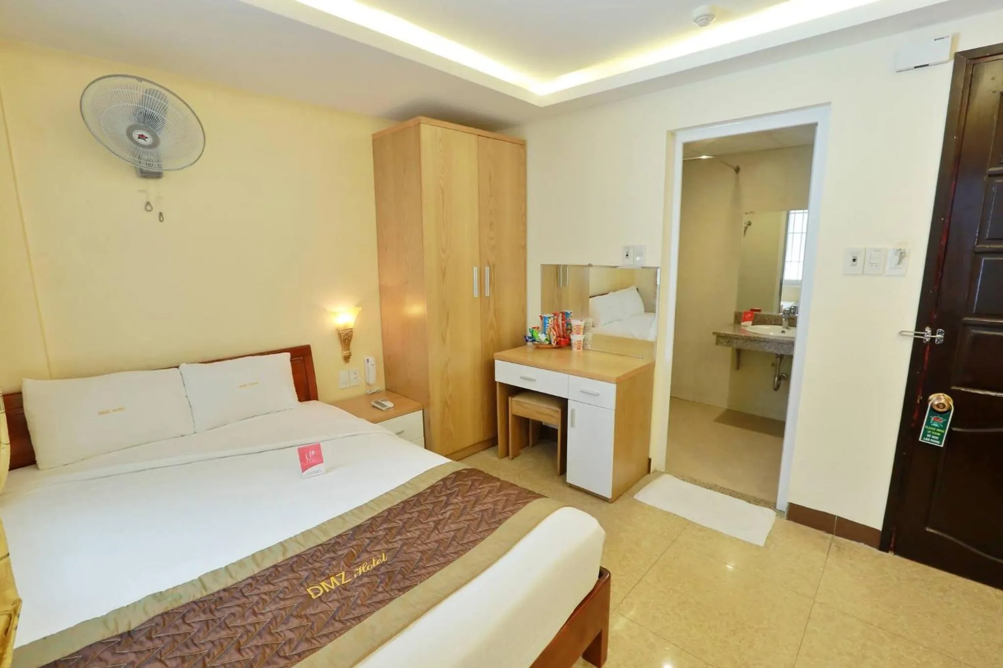 Photo of the whole room, Bed in DMZ Hotel ,Central Hue ,Near Perfume River