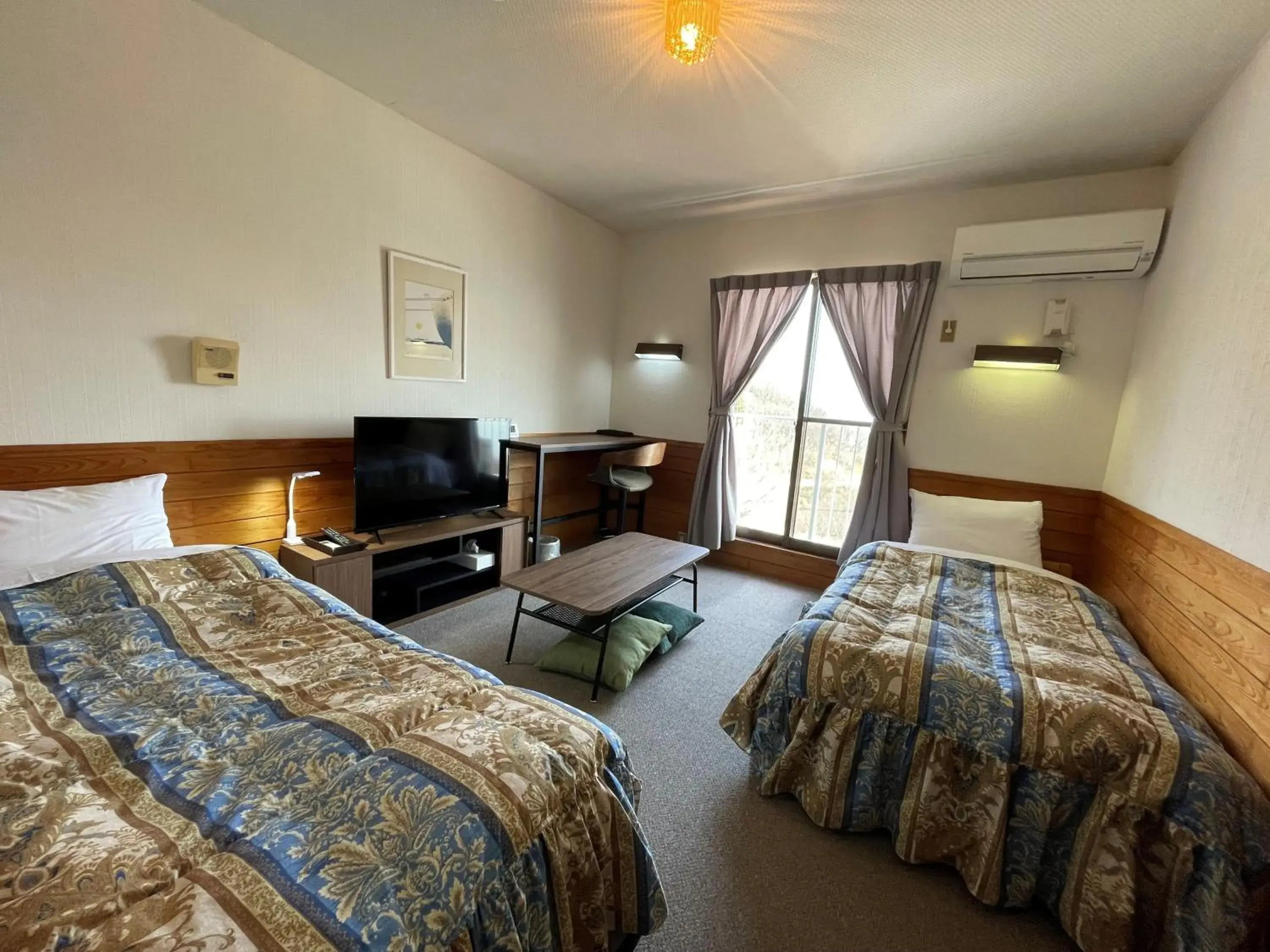 Bed in Pension KUROSHIOMARU Bed in Pension KUROSHIOMARU