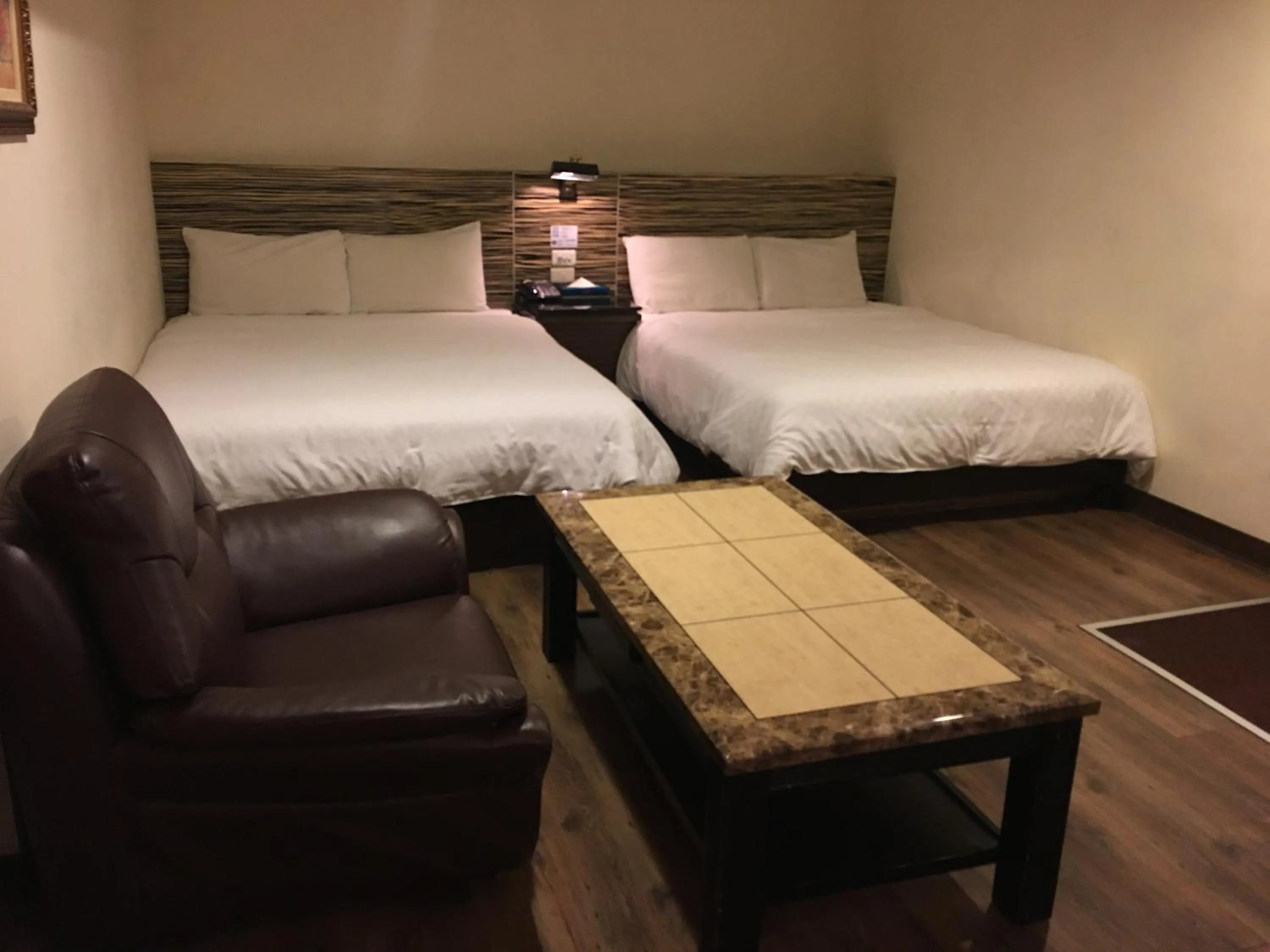 Bed in Hua Tai Hotel