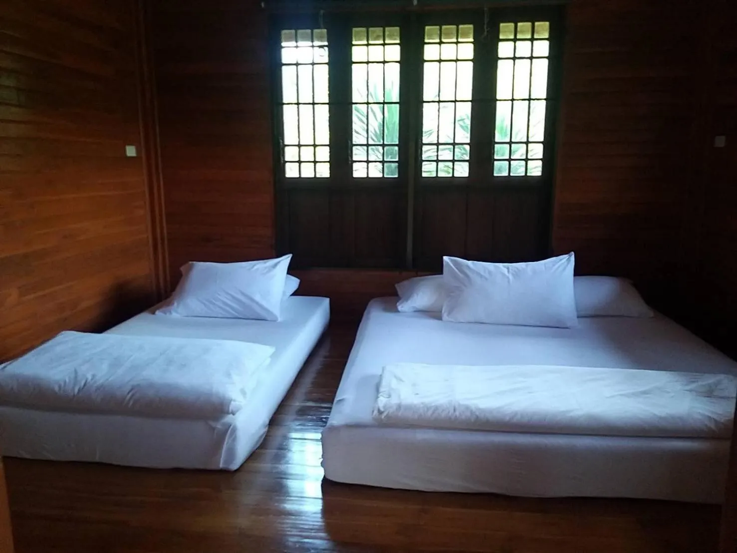 Bed in BaanRai KhunYa บ้านไร่คุณย่า