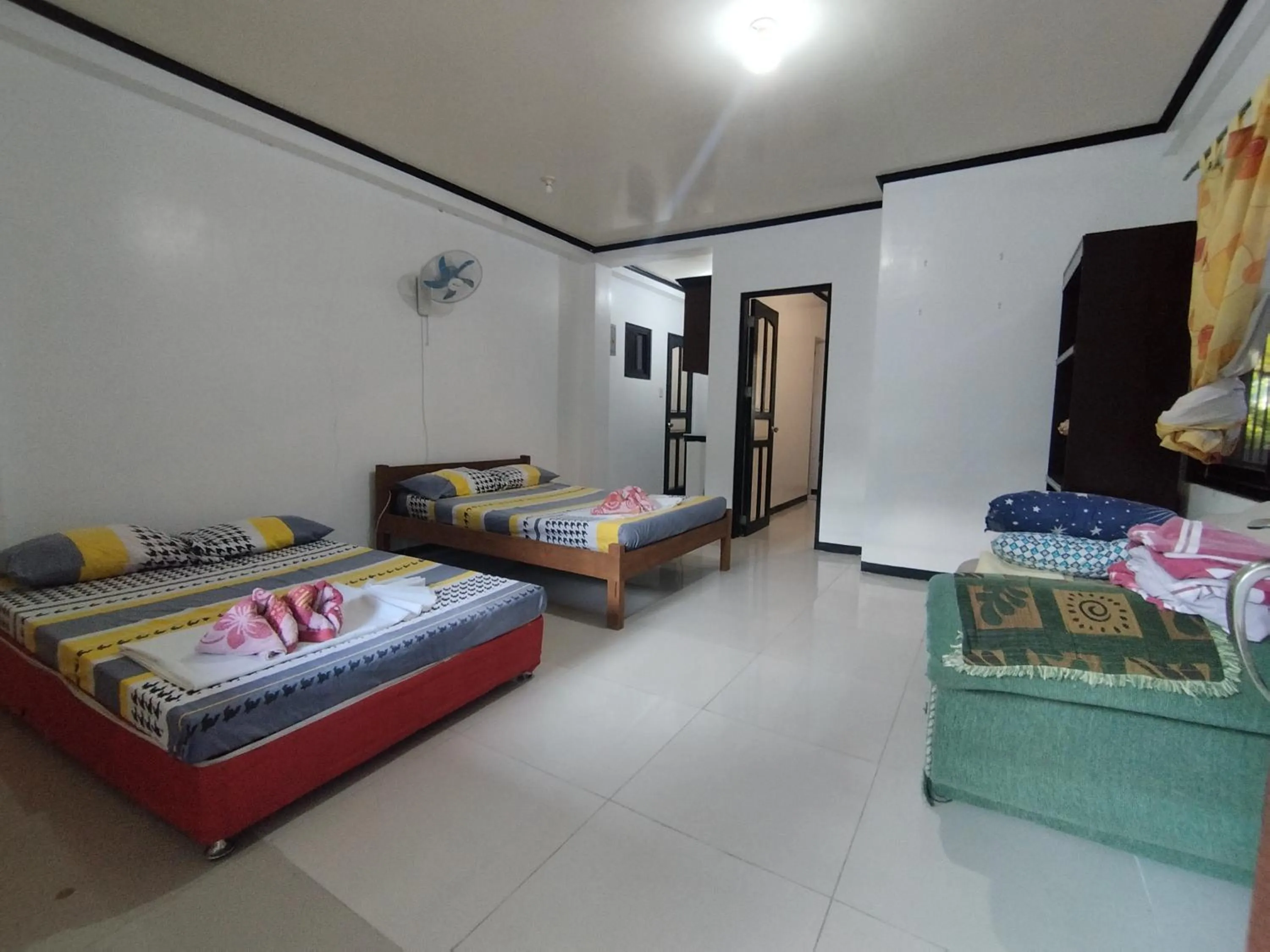 Bed in Riverside at Aninuan Accommodation and Food