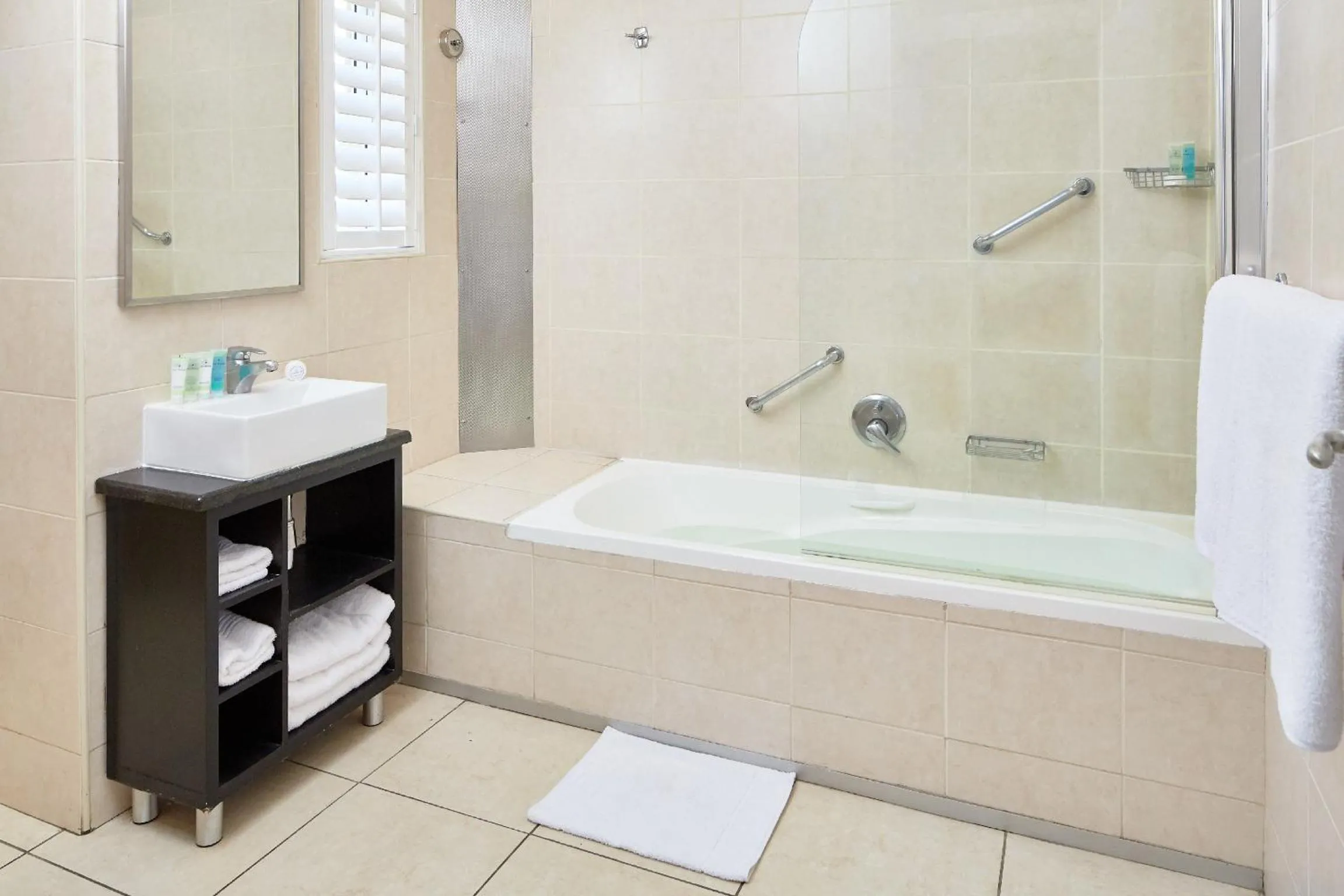 Bathroom in First Group Riviera Suites