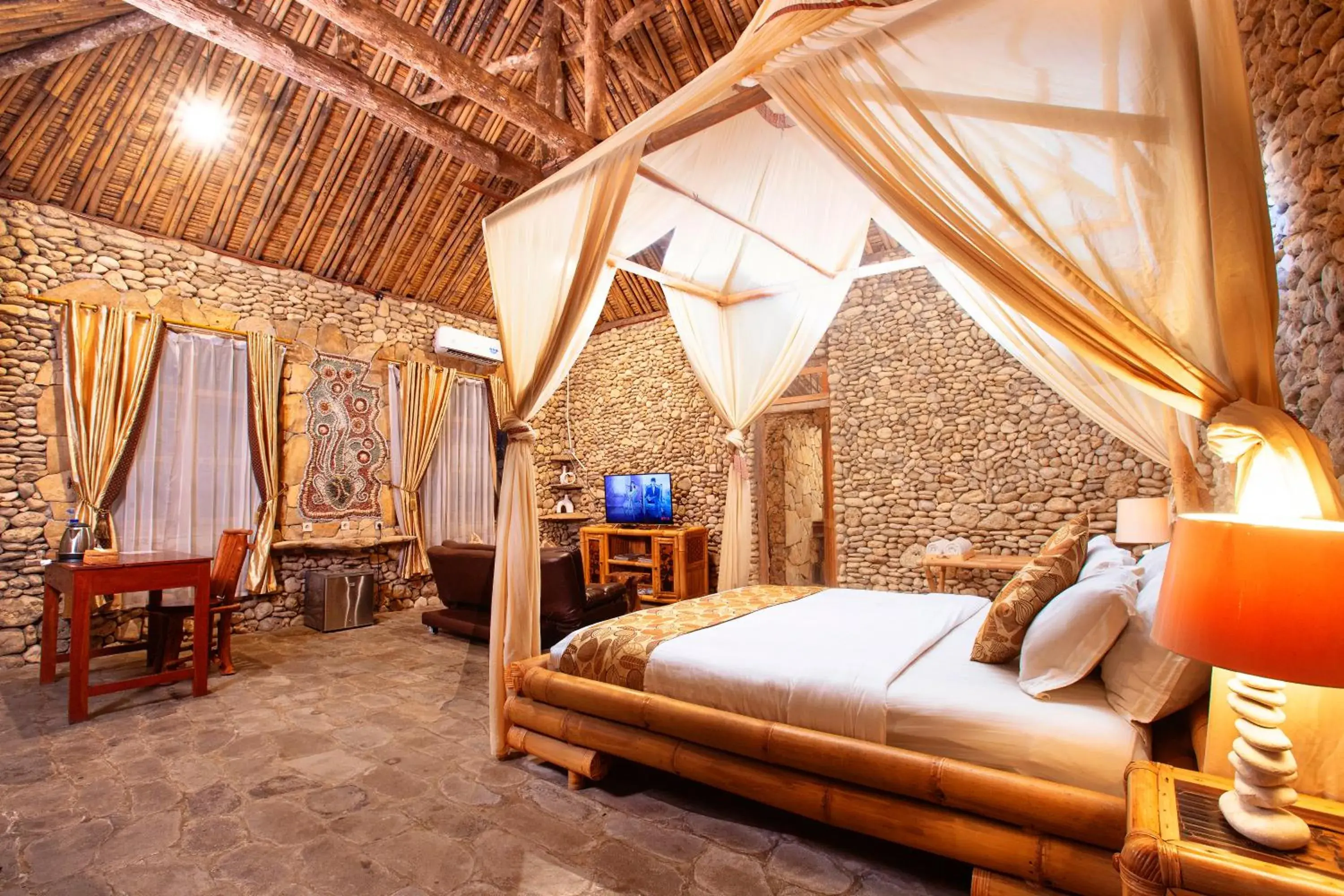 Bed in Rajaklana Resort and Spa Bed in Rajaklana Resort and Spa