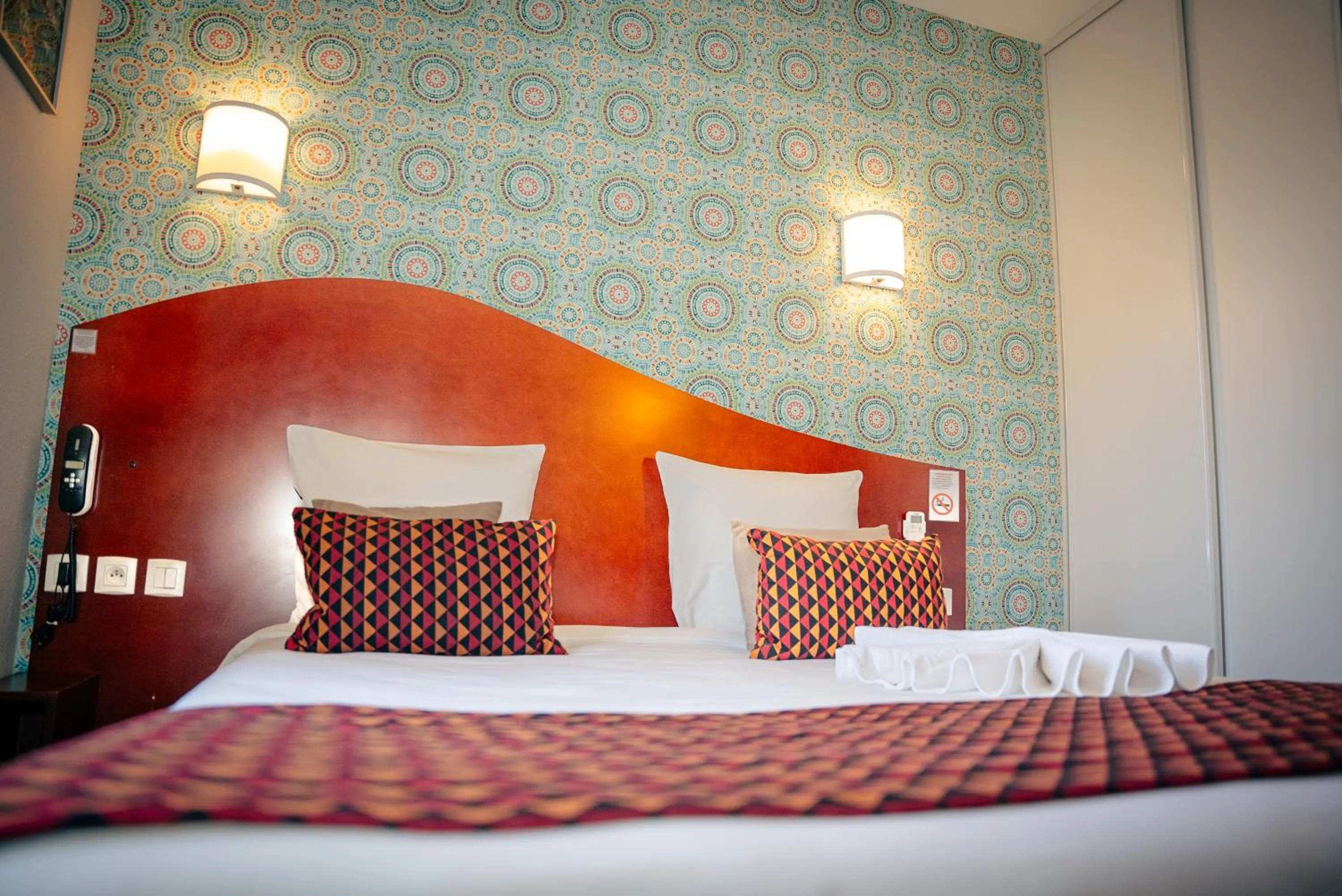 Bed in Hotel les Commercants