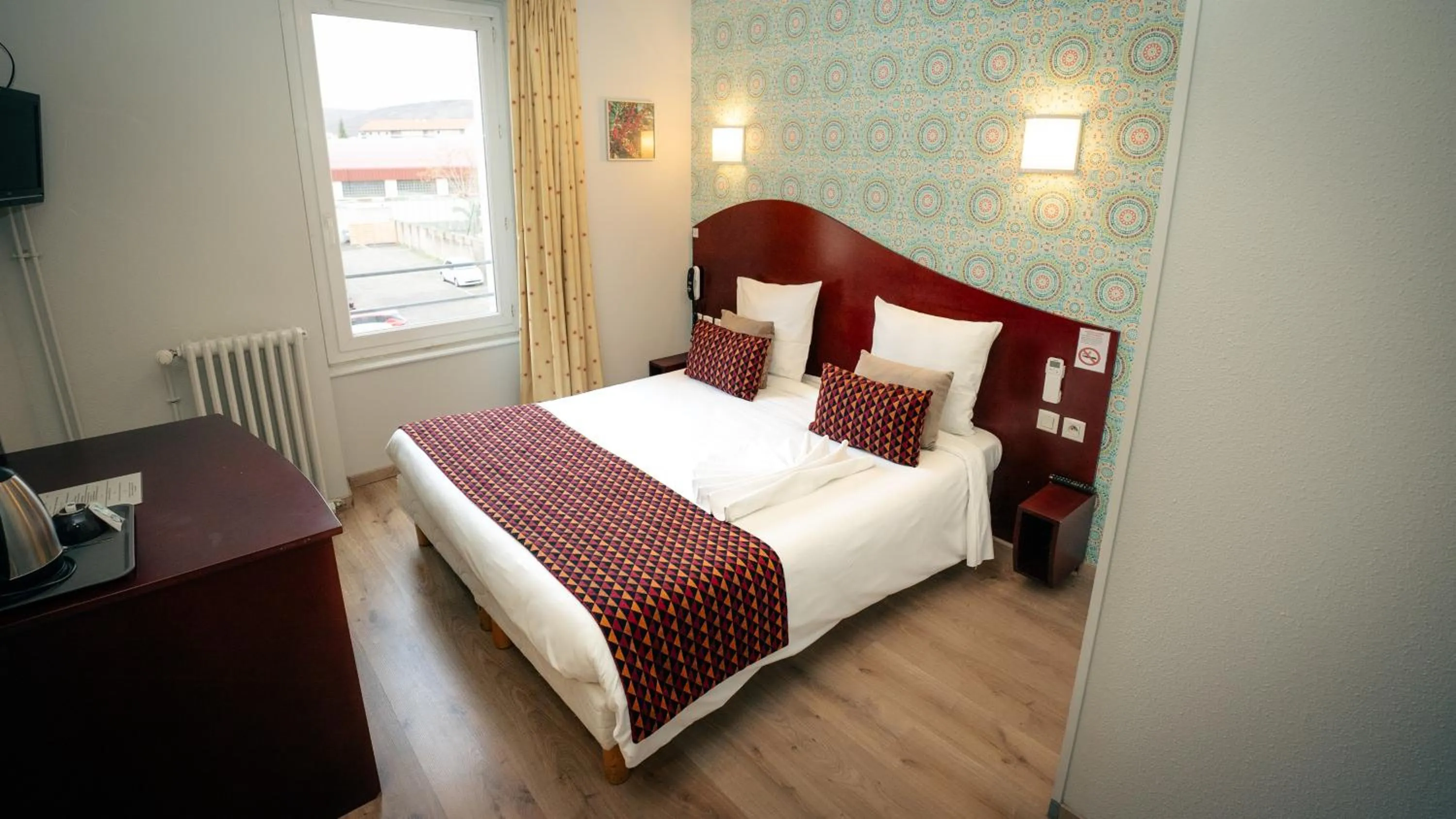 Bed in Hotel les Commercants