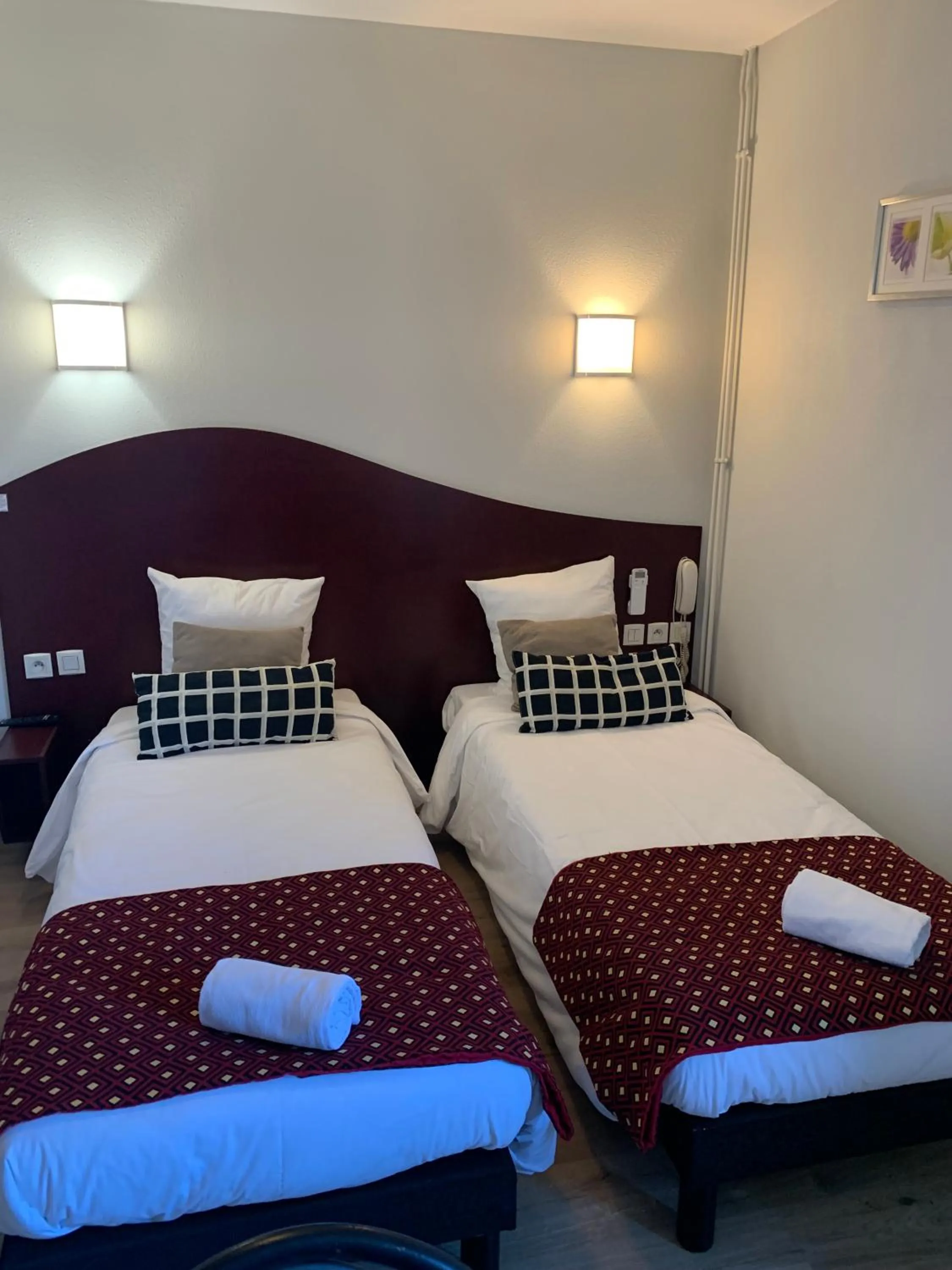 Bed in Hotel les Commercants