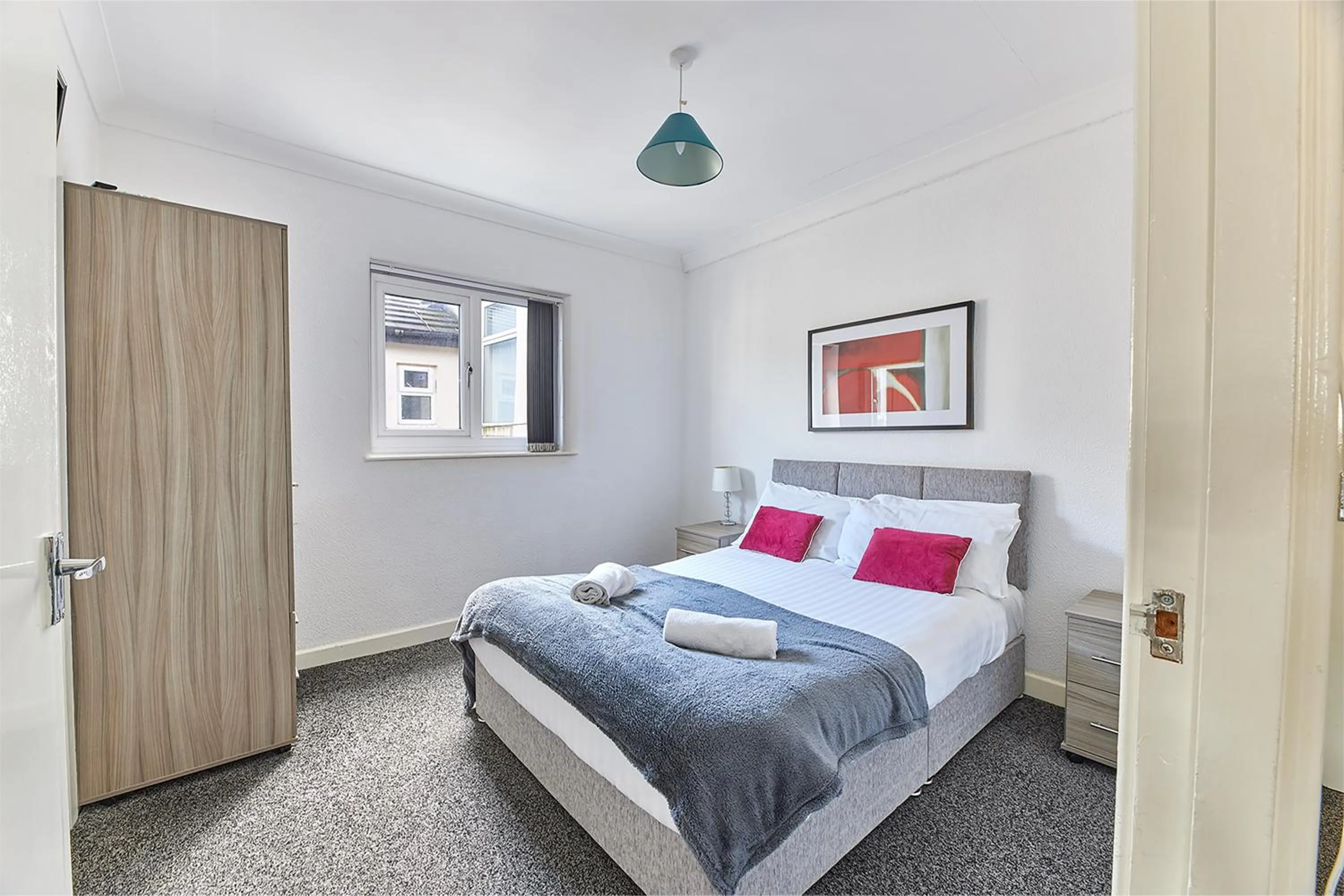 Bed in Pleasure Holiday Apartments