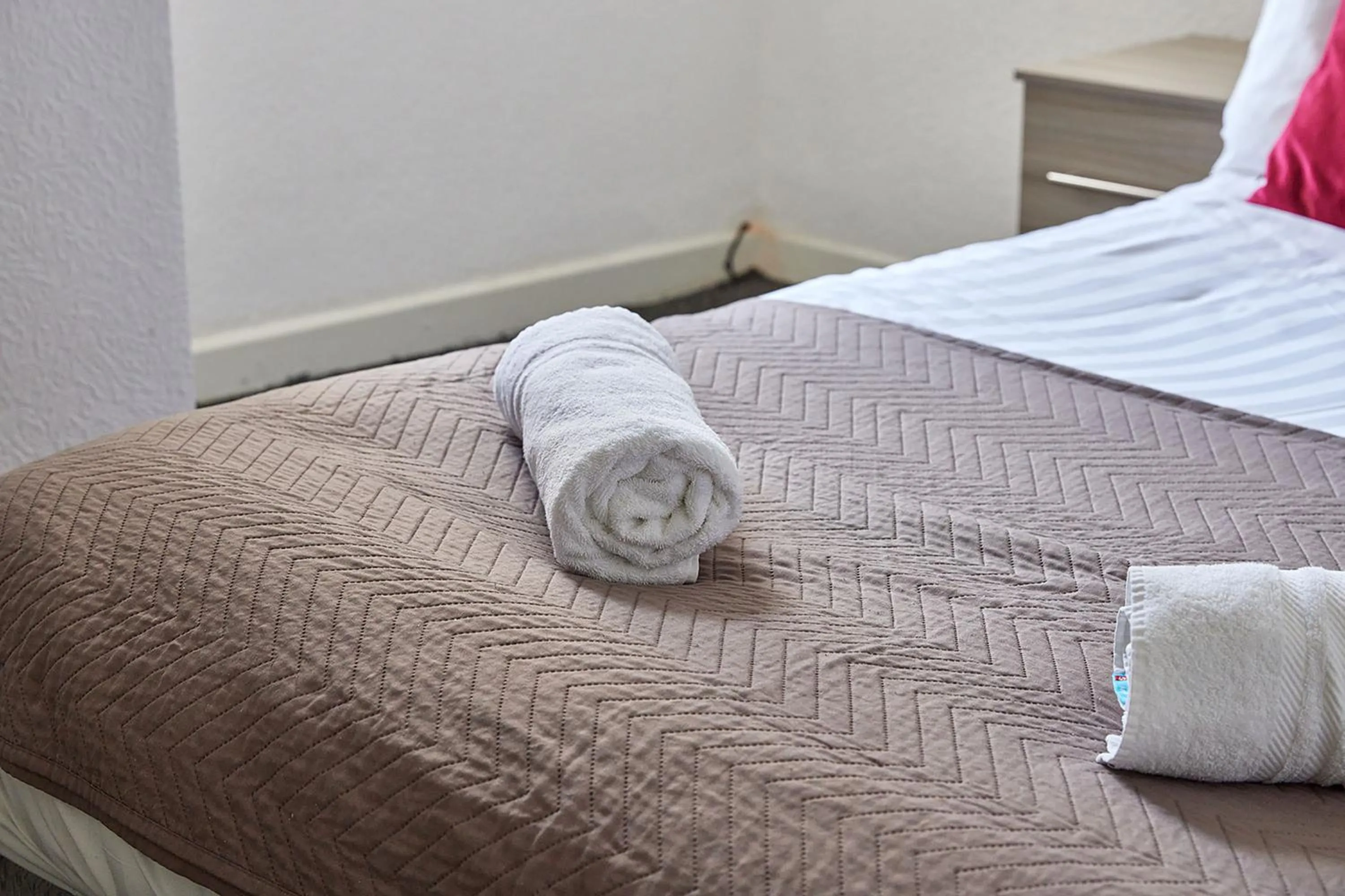 Bed in Pleasure Holiday Apartments