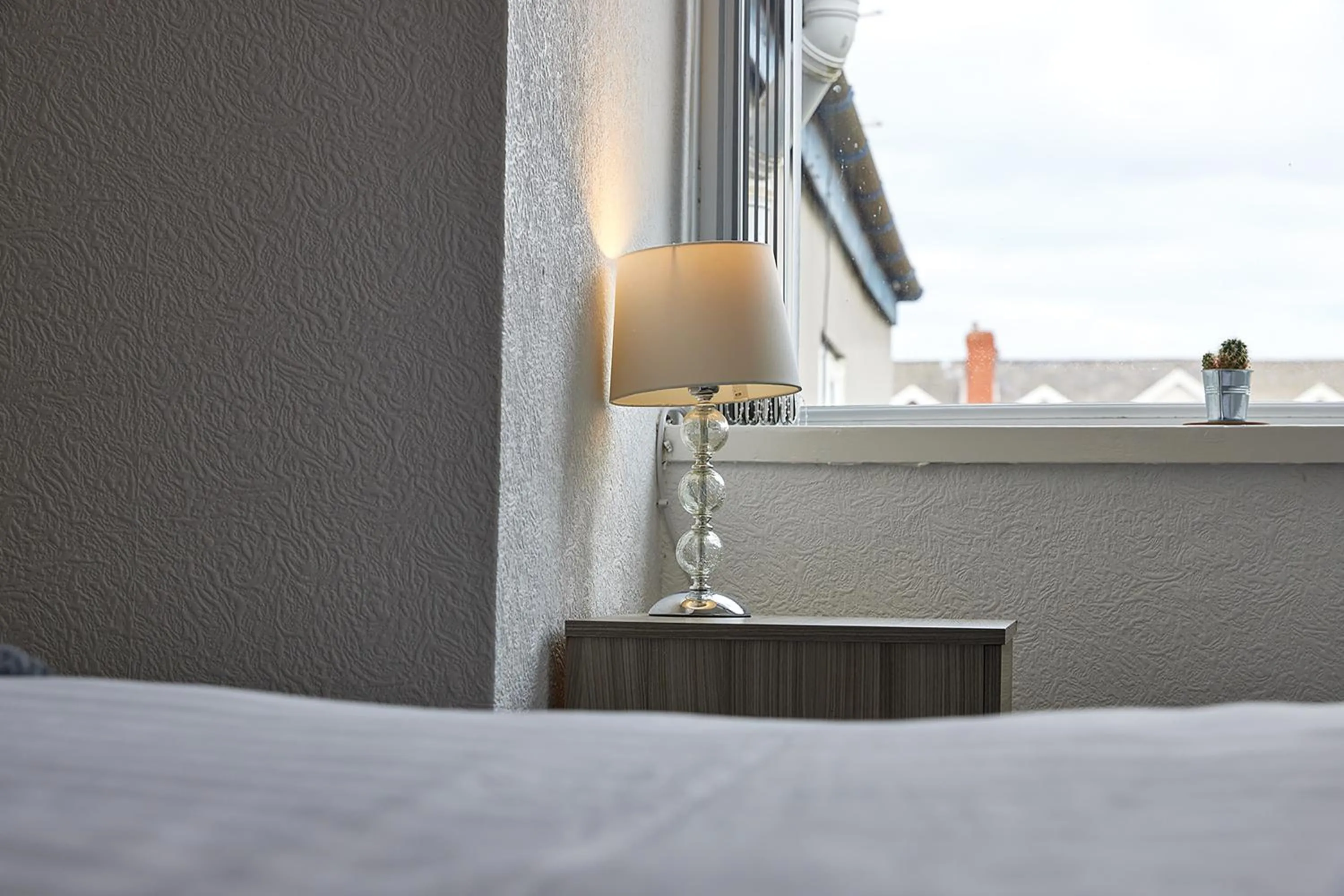 Bed in Pleasure Holiday Apartments