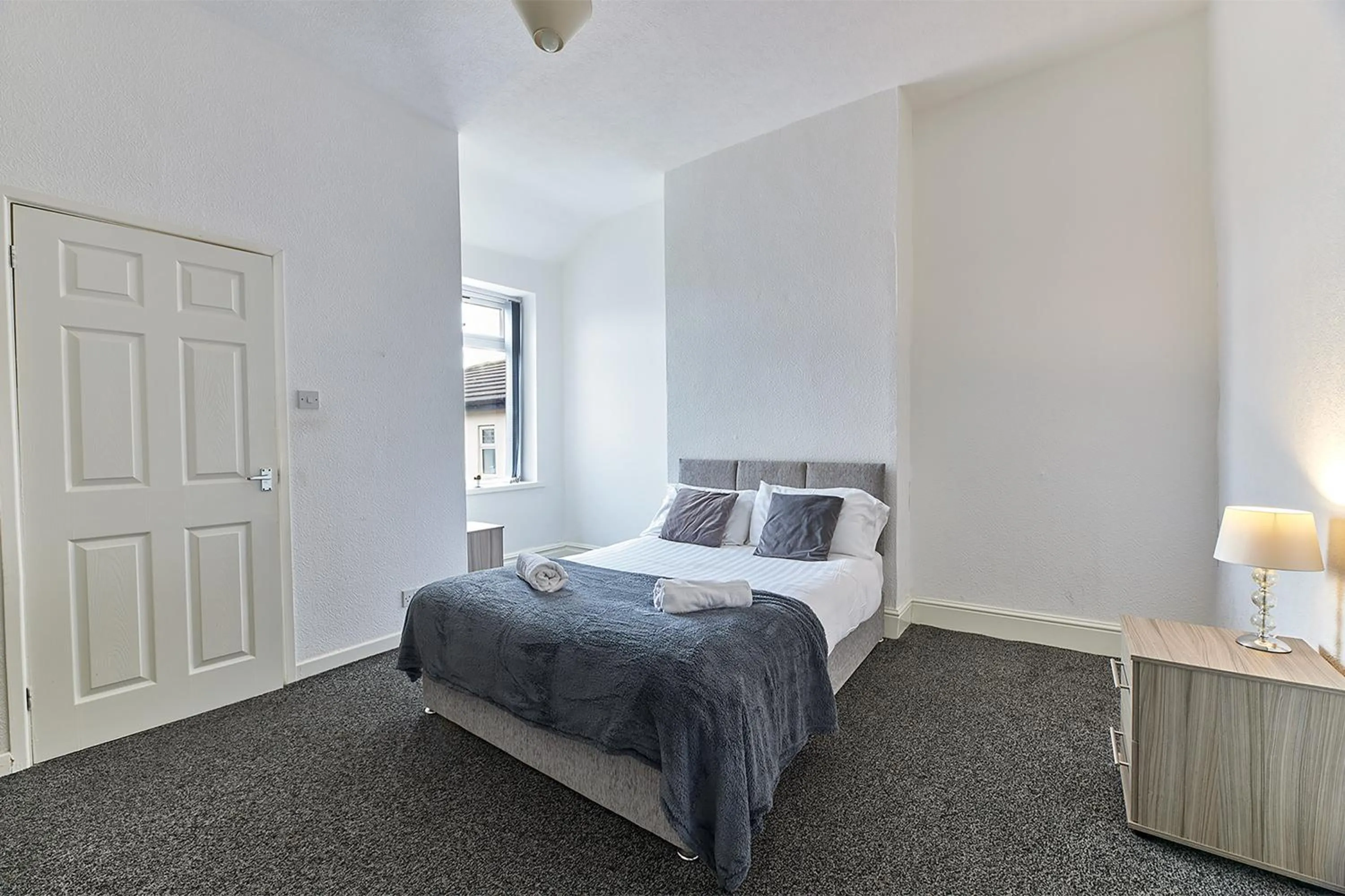 Bed in Pleasure Holiday Apartments