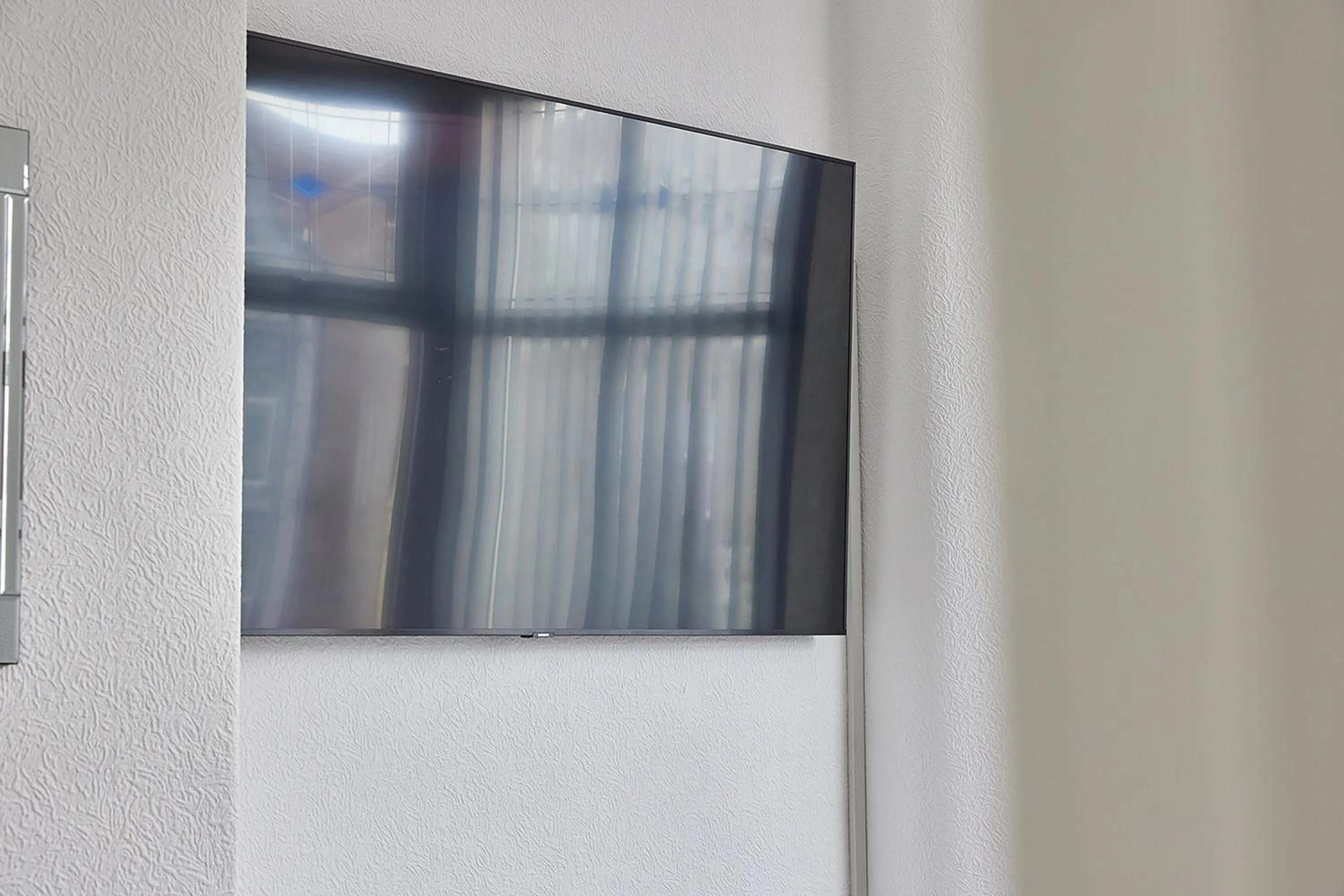 TV and multimedia in Pleasure Holiday Apartments