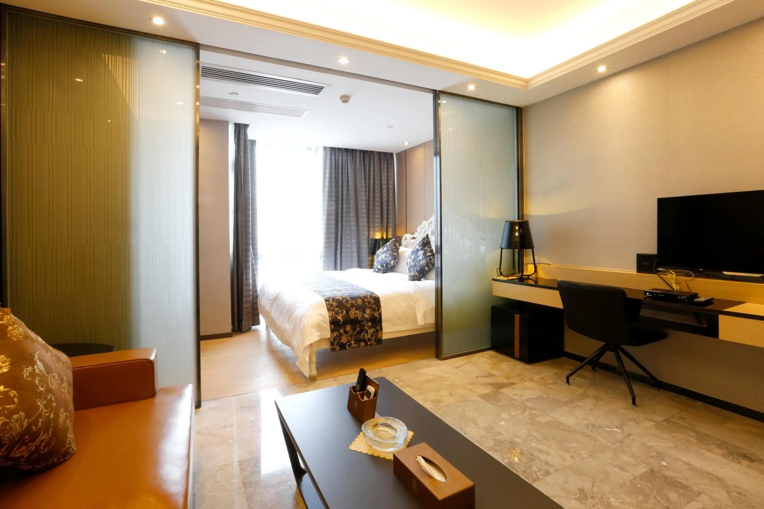 Bed in Boman Holiday Apartment Beijing Road Jie Deng Du Hui Branch