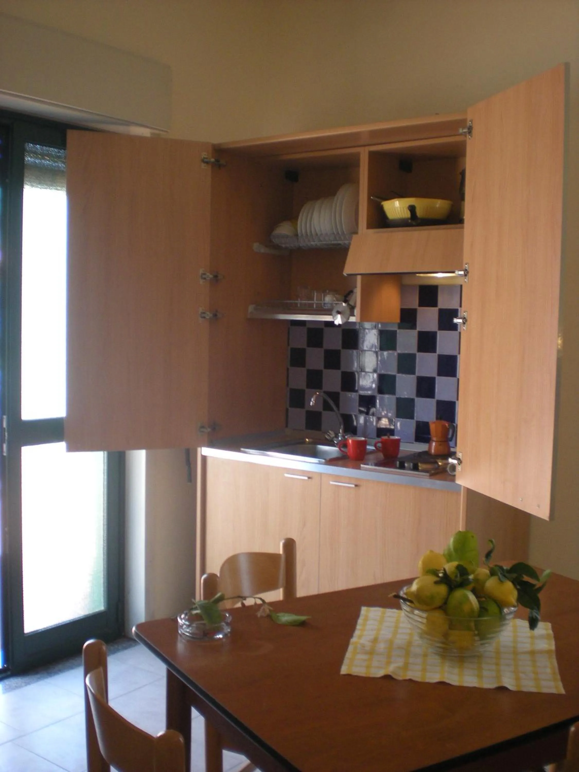 Kitchen or kitchenette in Villaggio Artemide