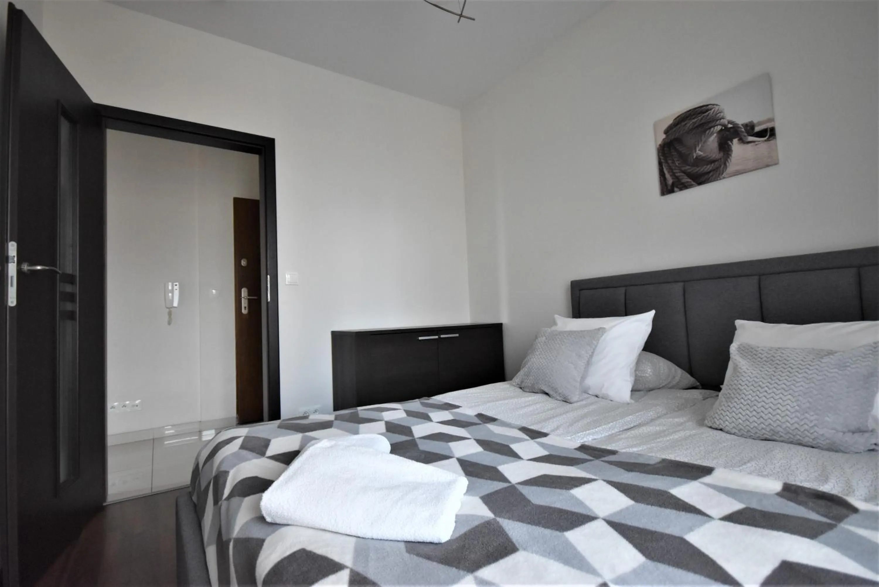 Bed in Senator Warsaw Apartments