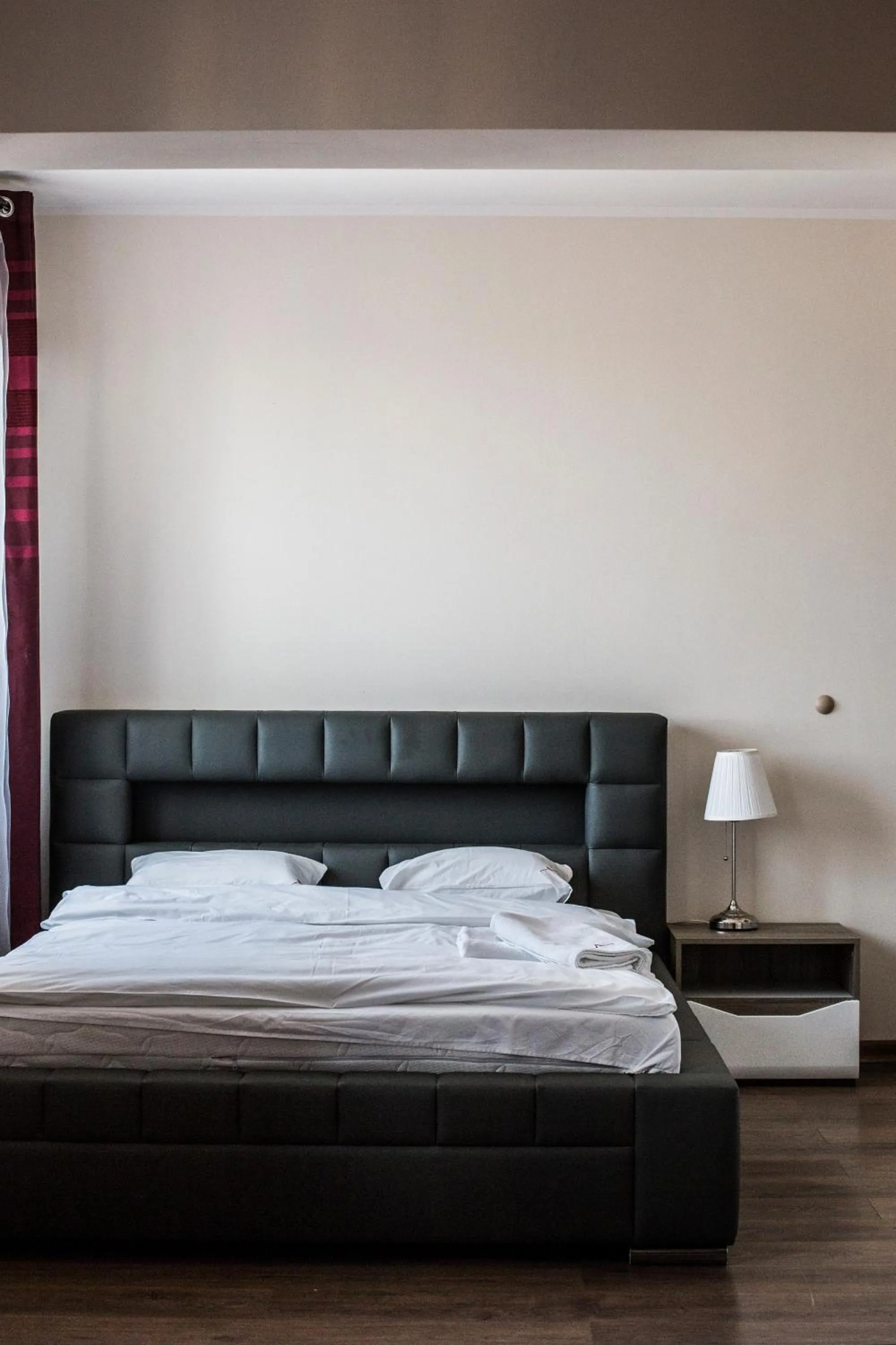 Bed in Senator Warsaw Apartments