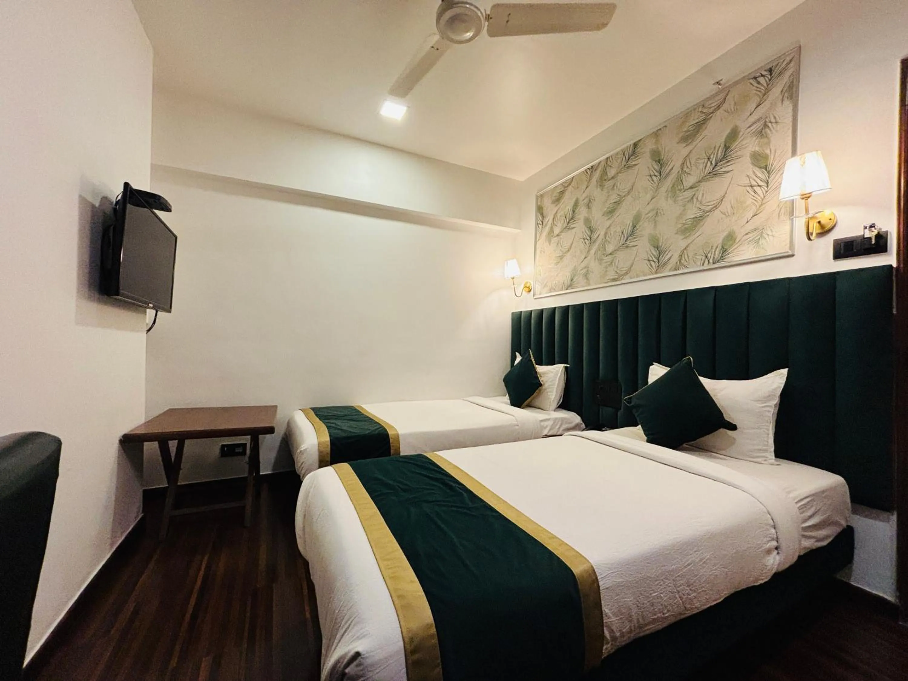 Bed in J Hotel and Banquets