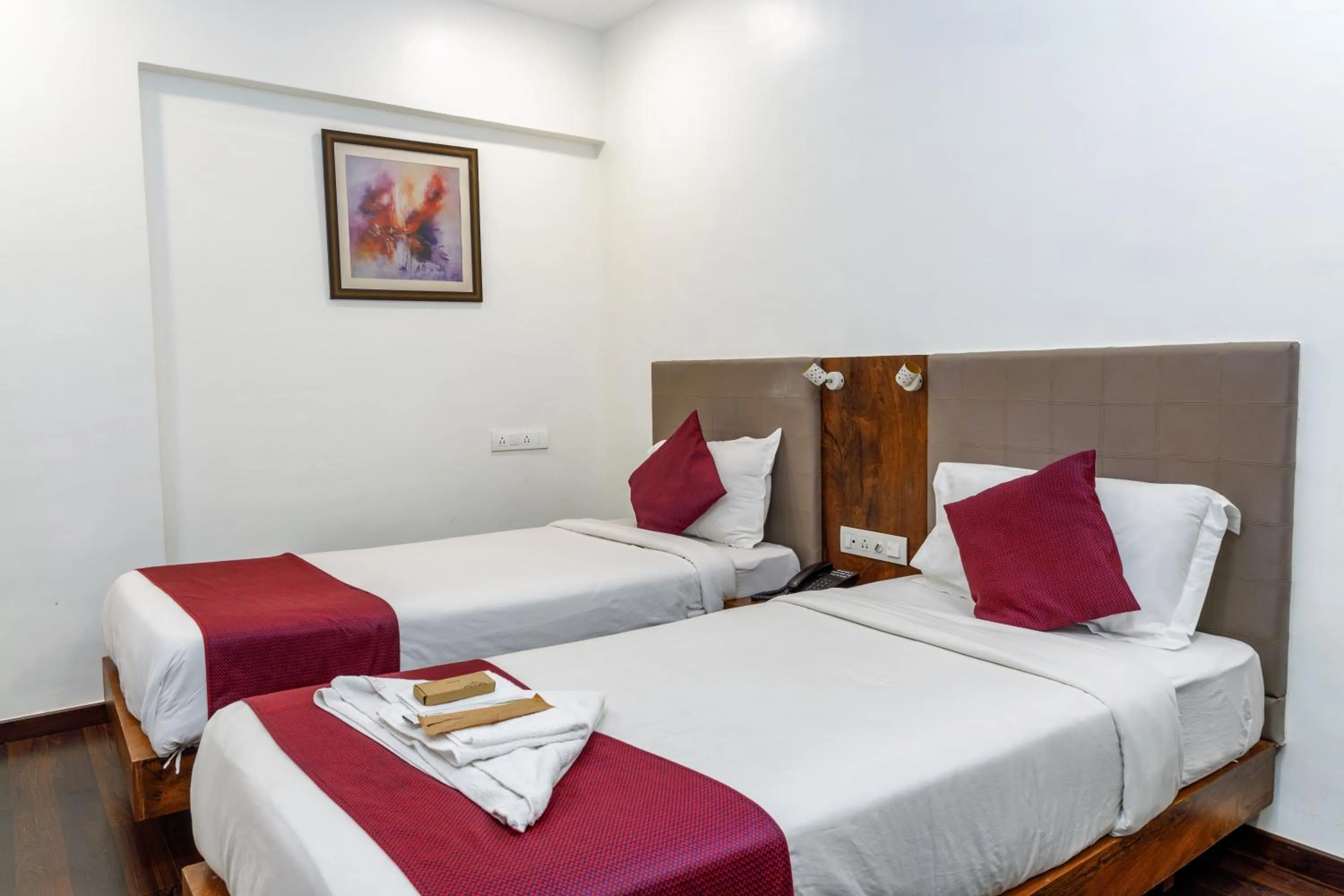 Bed in J Hotel and Banquets