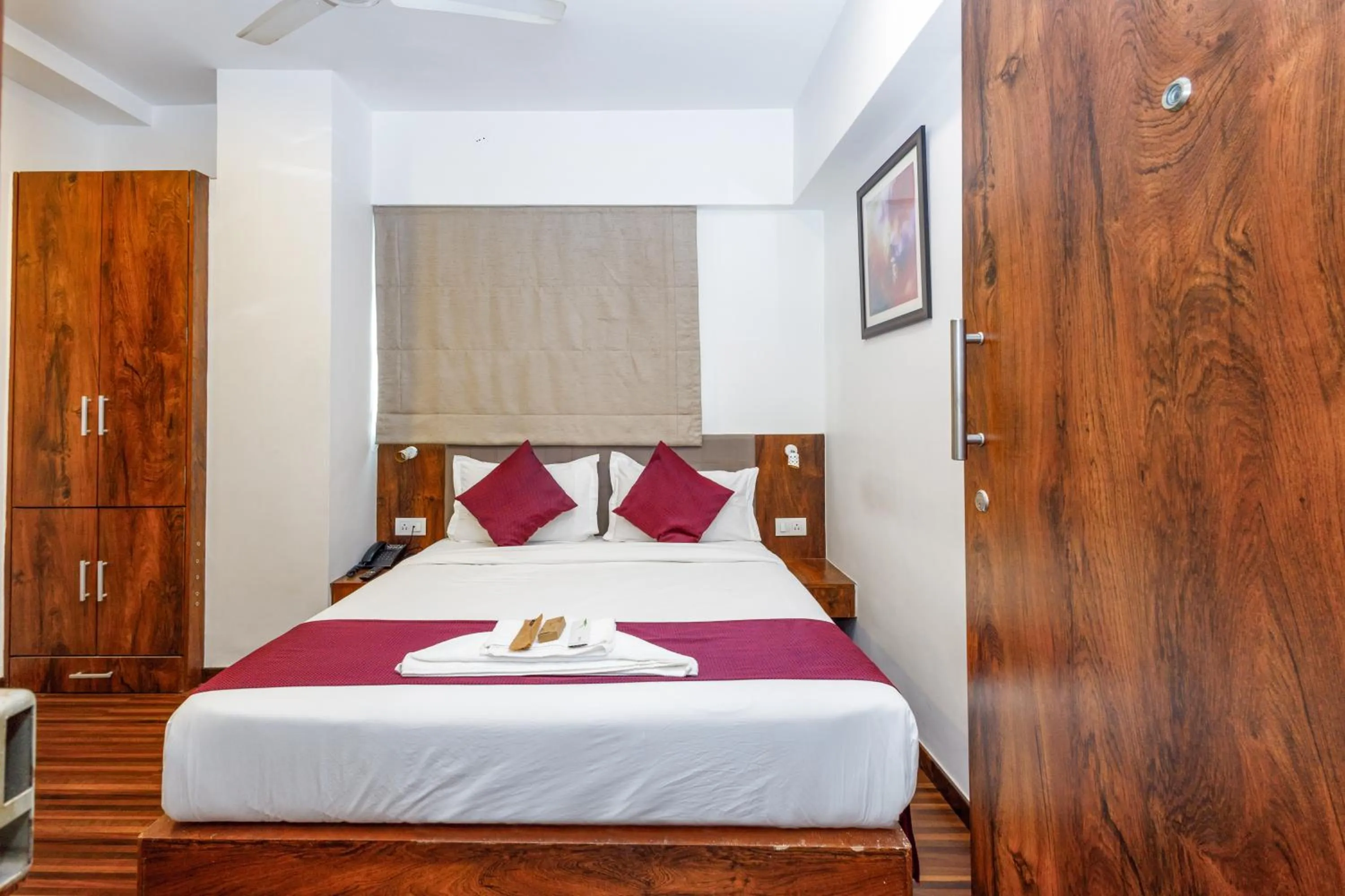 Bed in J Hotel and Banquets