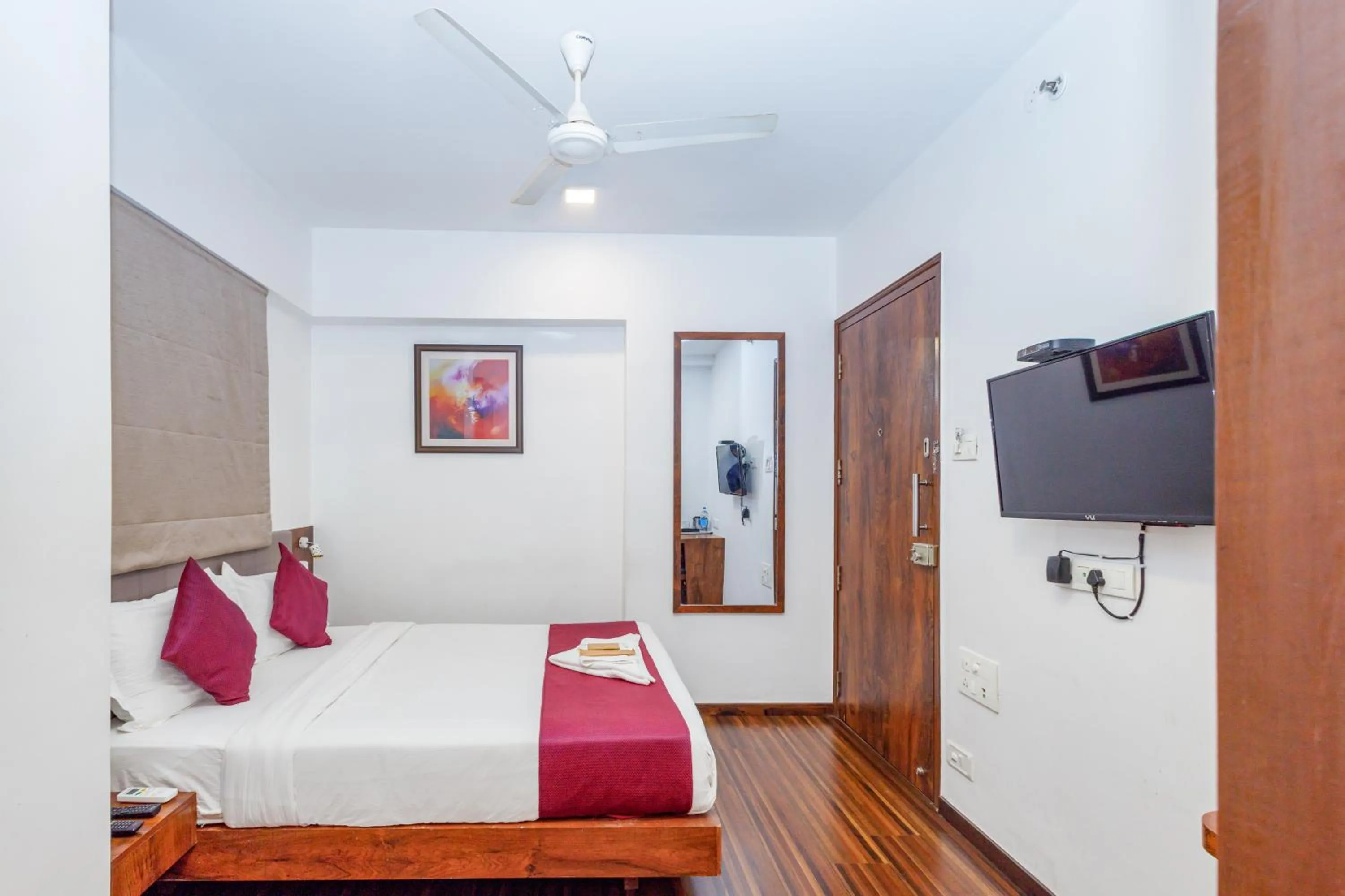 Bed in J Hotel and Banquets