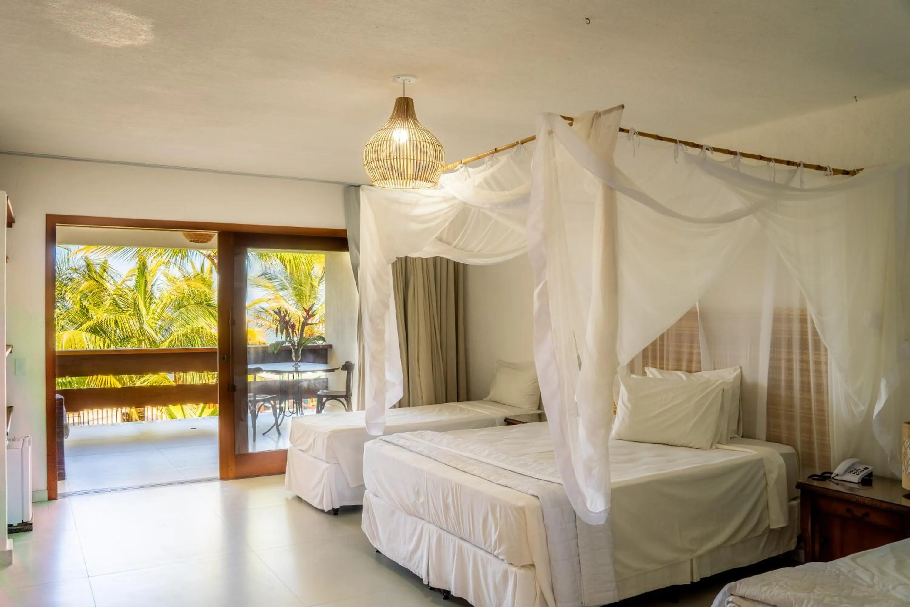 Bed in Arraial Bangalô Praia Hotel