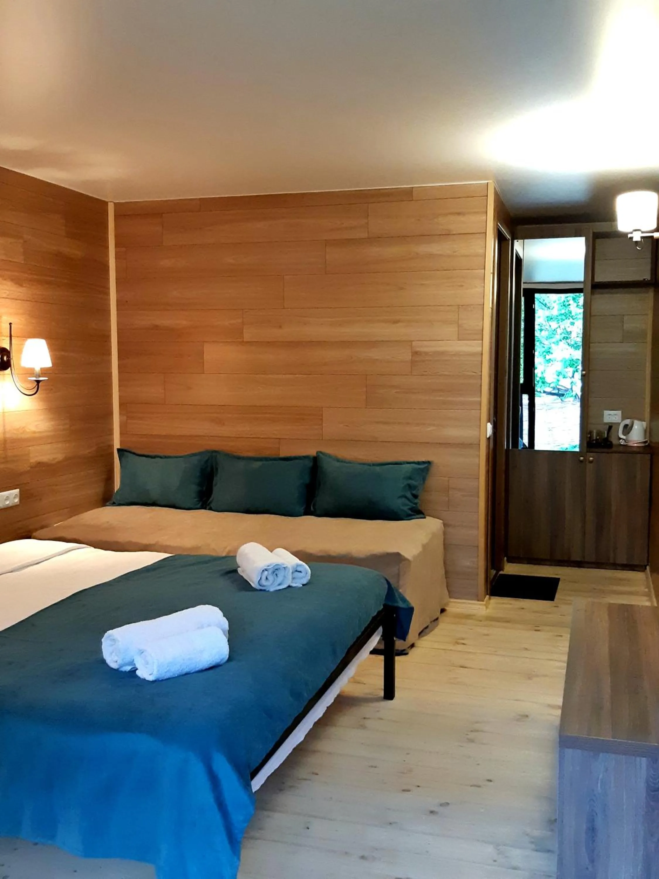 Bed in Kazbegi Cottages