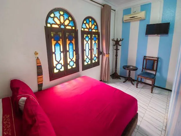 Bed in Hotel Sevilla