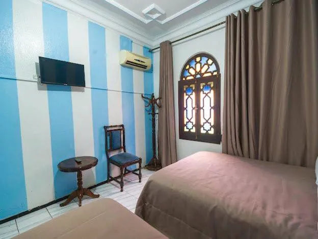 Bed in Hotel Sevilla